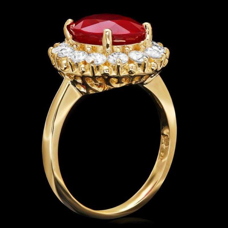 5.70 Carats Impressive Red Ruby and Natural Diamond 14K Yellow Gold Ring

Total Red Ruby Weight is: Approx. 4.60 Carats

Ruby Measures: Approx. 11.00 x 9.00mm

Ruby treatment: Fracture Filling

Natural Round Diamonds Weight: Approx. 1.10 Carats