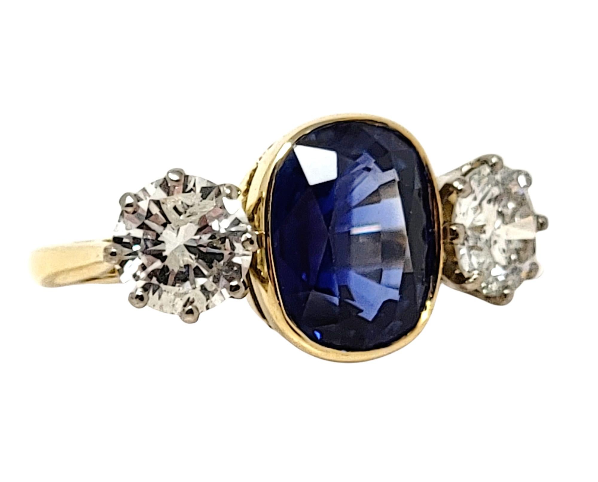 Contemporary 5.70 Carats Total Cushion Cut Natural Blue Sapphire and Diamond Three Stone Ring For Sale