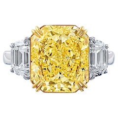 Bague de fiançailles 5,70 ct Fancy Yellow Intense en platine et or jaune 18K