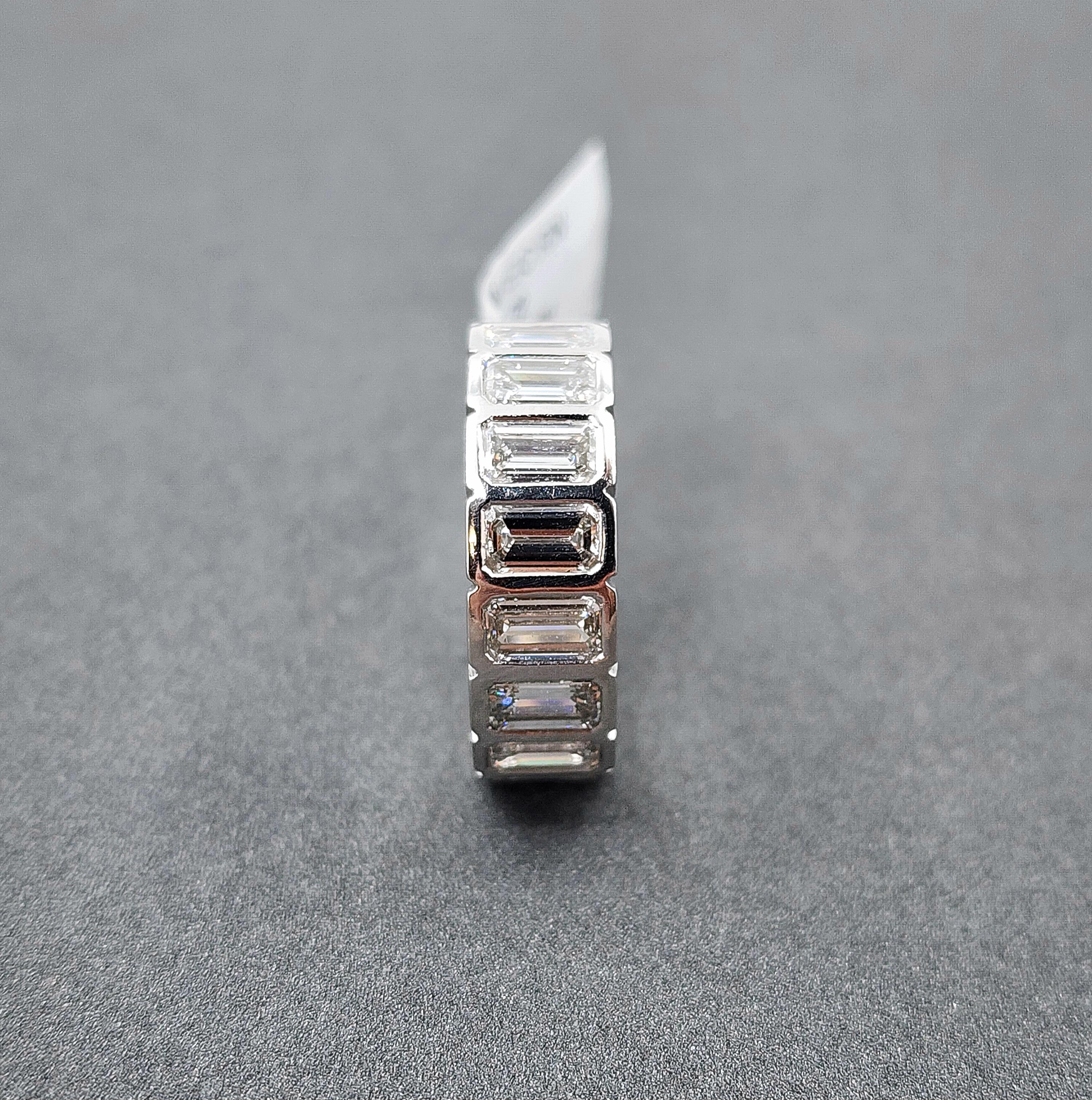 5.72 Carat Emerald-Cut Bezel-Set Diamond Eternity Ring, 17 Diamonds, Platinum In New Condition For Sale In Chicago, IL