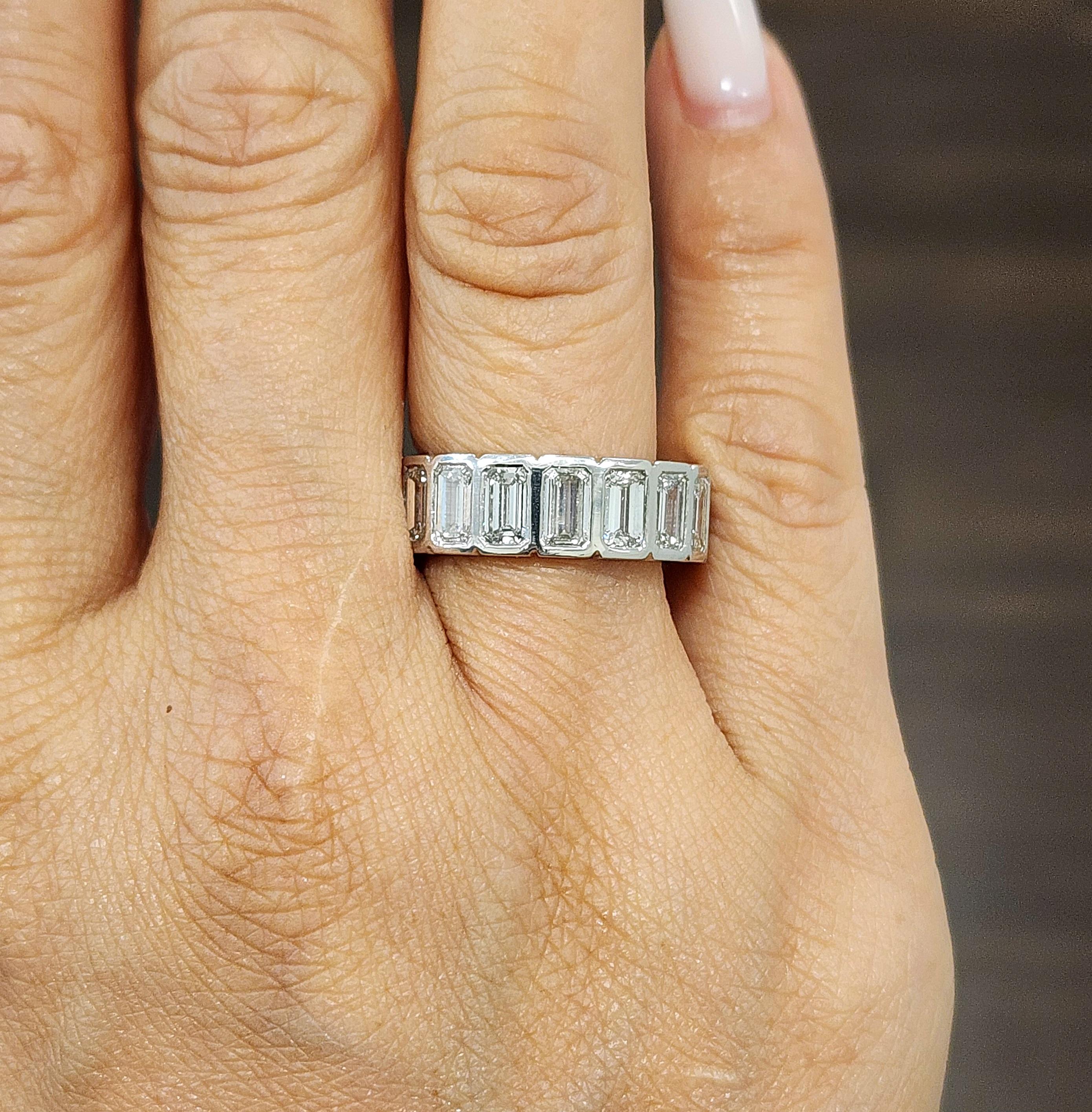 Emerald Cut 5.72 Carat Emerald-Cut Bezel-Set Diamond Eternity Ring, 17 Diamonds, Platinum For Sale
