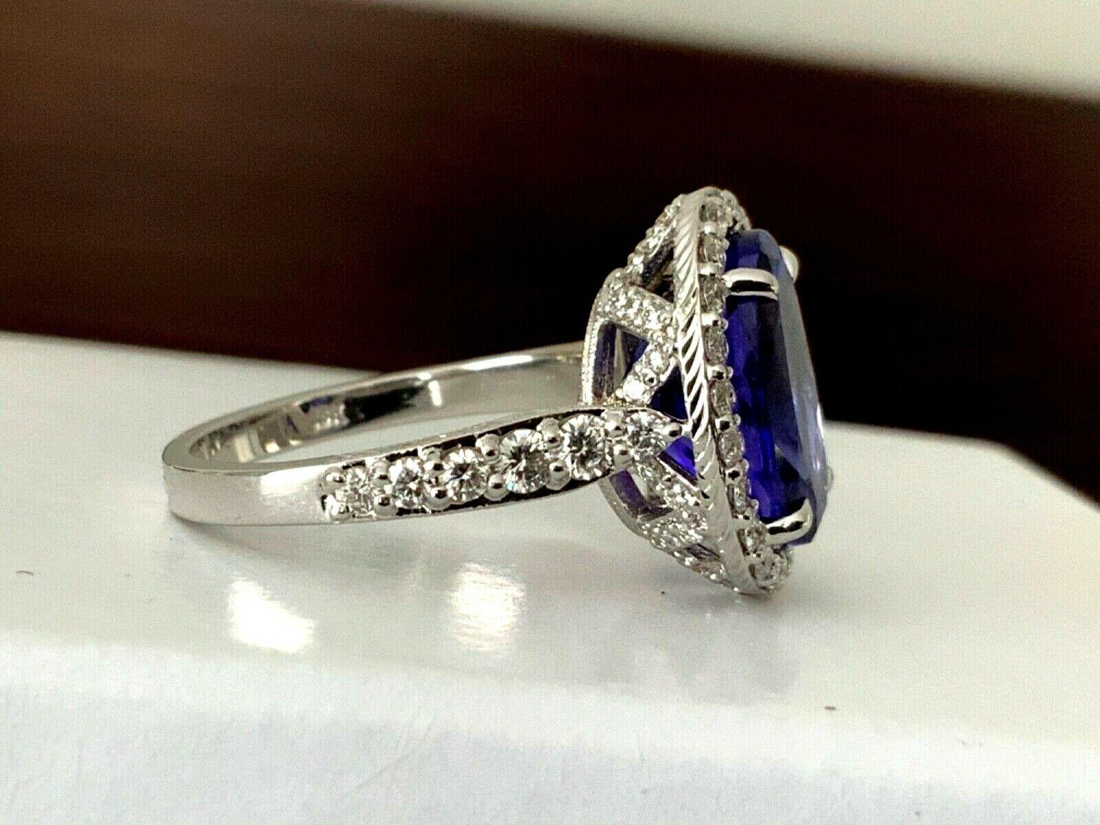 5.72 Carat Natural Oval Violet Tanzanite and Diamond Ring Platinum GIA Certified For Sale 5