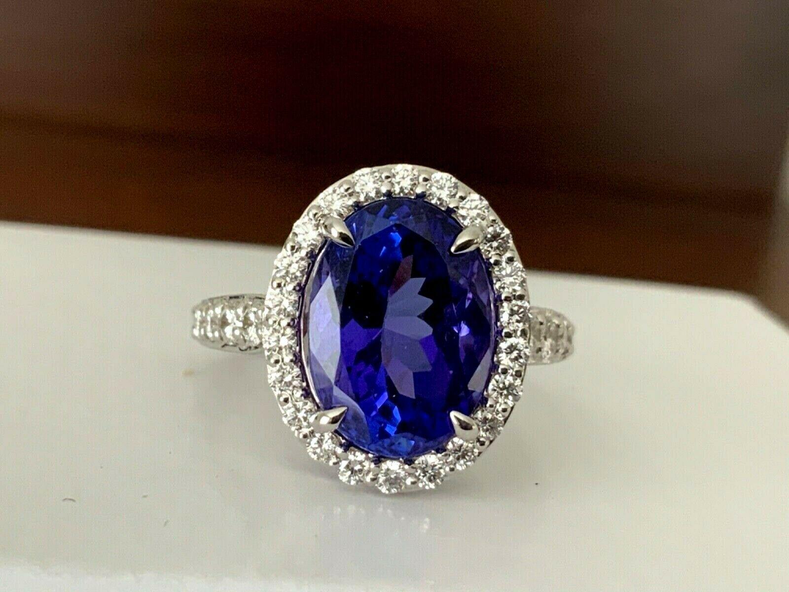 JUST IN TIME FOR THE HOLIDAYS!

We have been able to purchase one MOST VIVID 5.72 carat Natural Violet Tanzanite's we have ever seen.  The color of this tanzanite is a stunning vivid violet like you have never seen before.  The color is truly