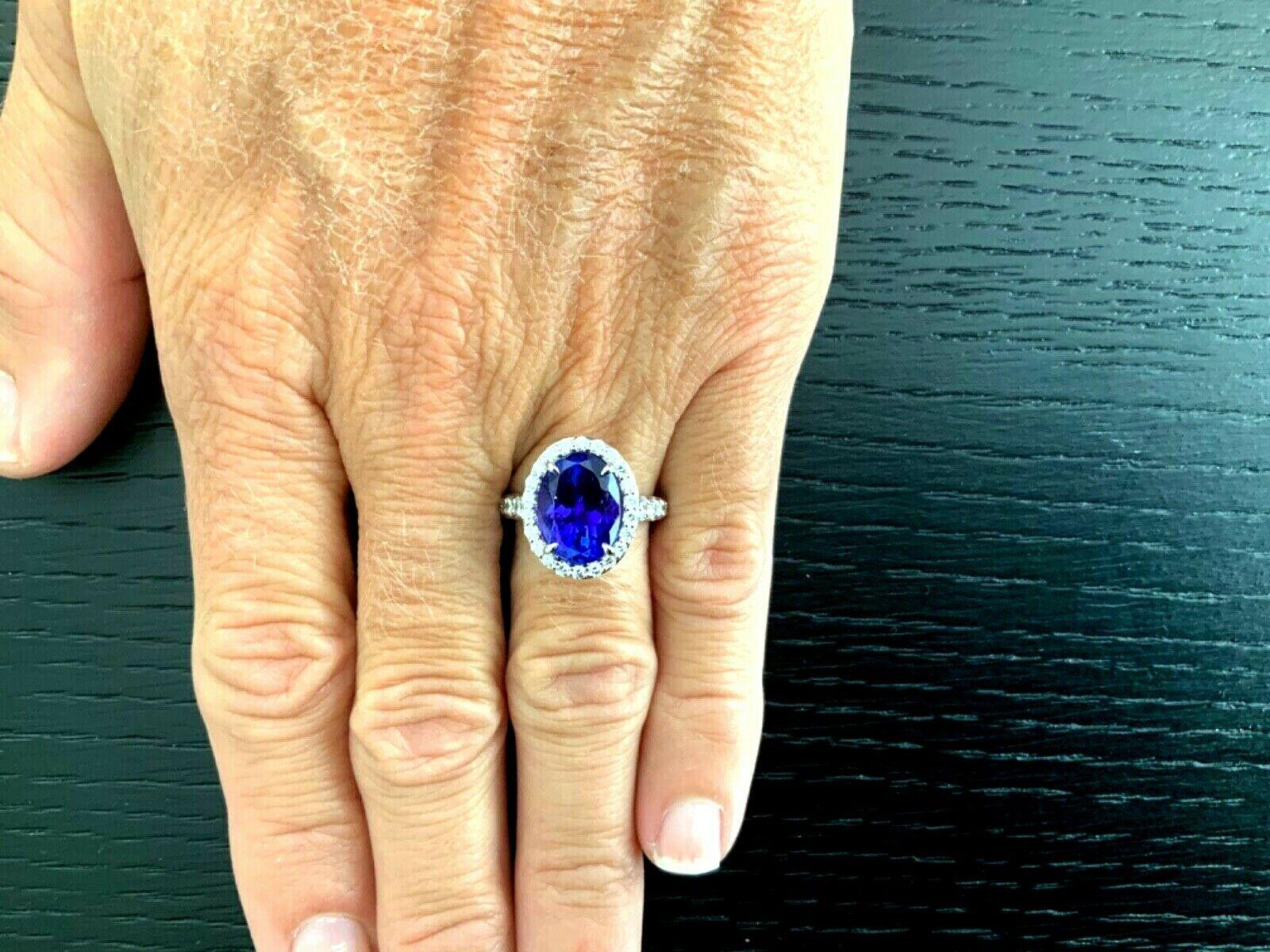 5.72 Carat Natural Oval Violet Tanzanite and Diamond Ring Platinum GIA Certified In New Condition For Sale In Middletown, DE