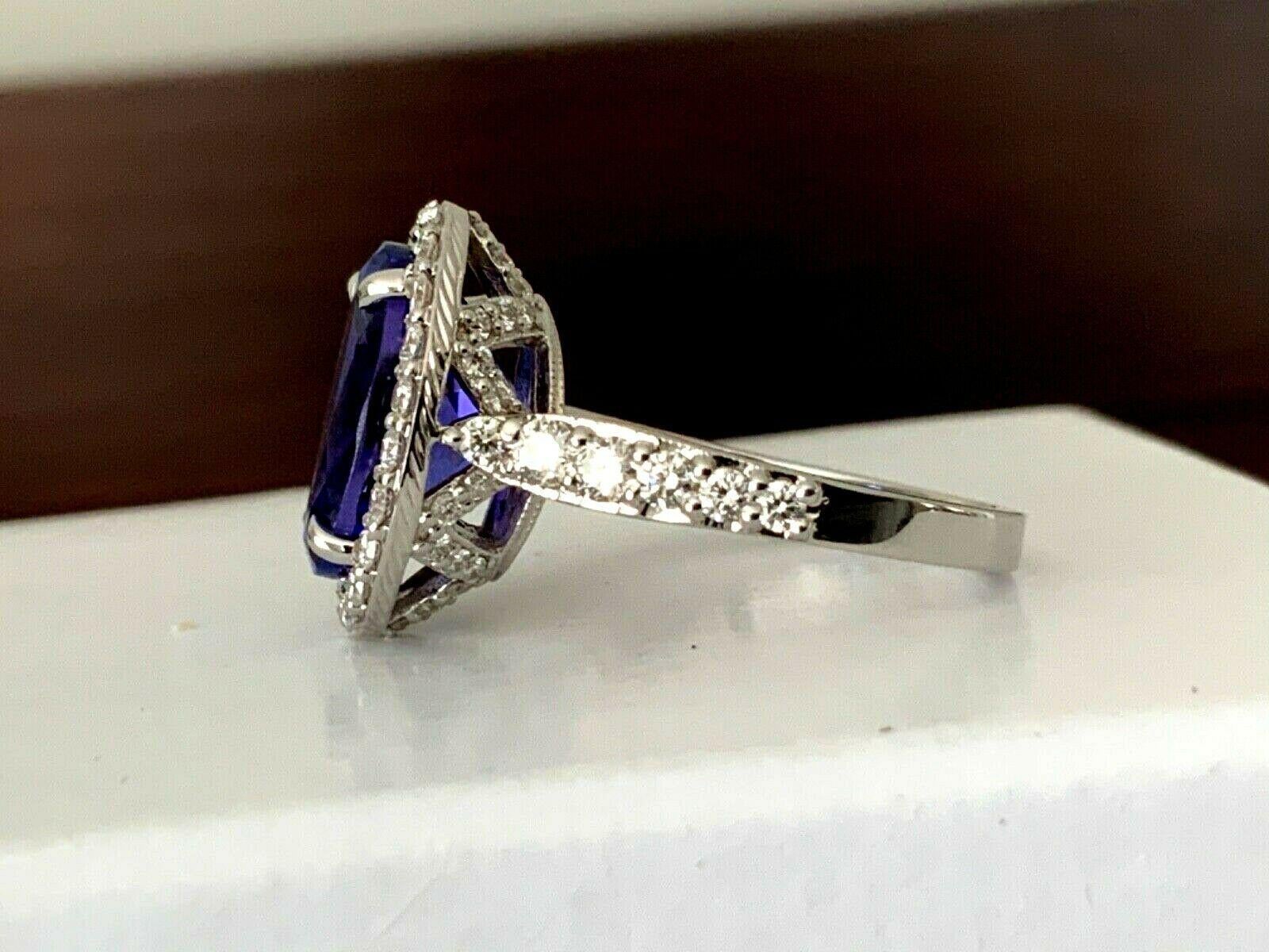 5.72 Carat Natural Oval Violet Tanzanite and Diamond Ring Platinum GIA Certified For Sale 4