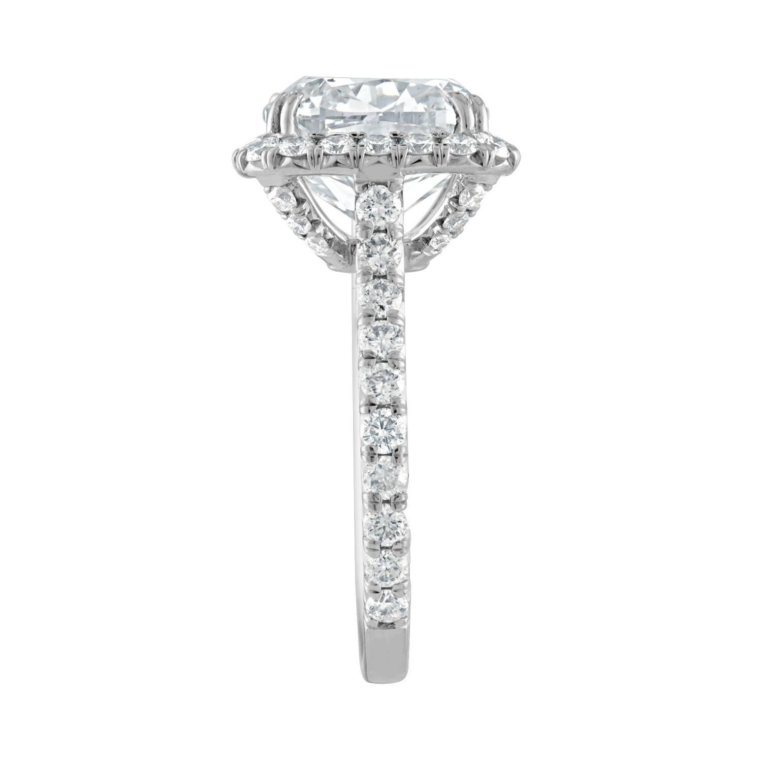 Contemporary 5.73 Carat Cushion Cut GIA Certified Set in Halo Ring Mounting