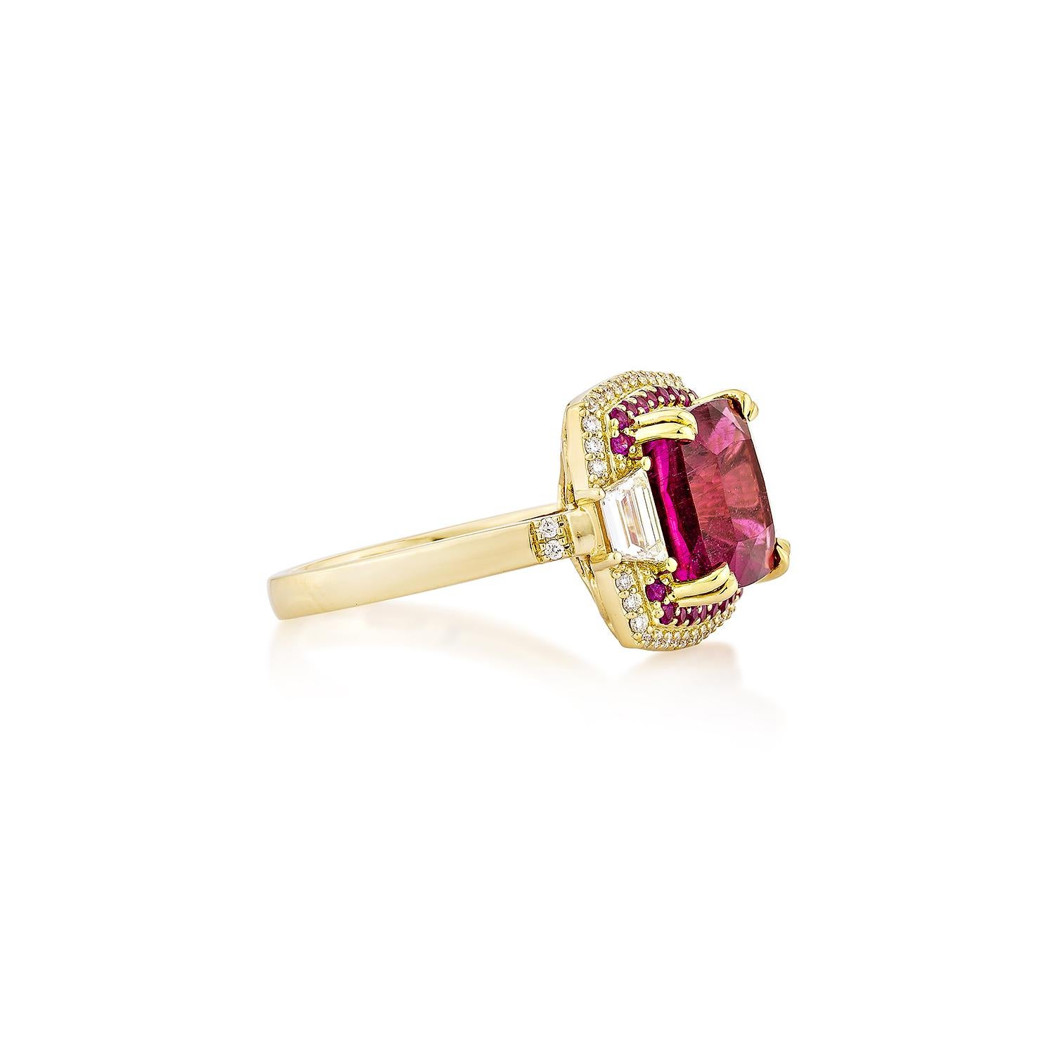 Sunita Nahata showcases an exquisite diamond studded Rubellite ring that exudes grace and elegance. This exquisite 18Karat yellow gold ring is ideal for any special occasion because it combines traditional elegance with modern flair.

Rubellite