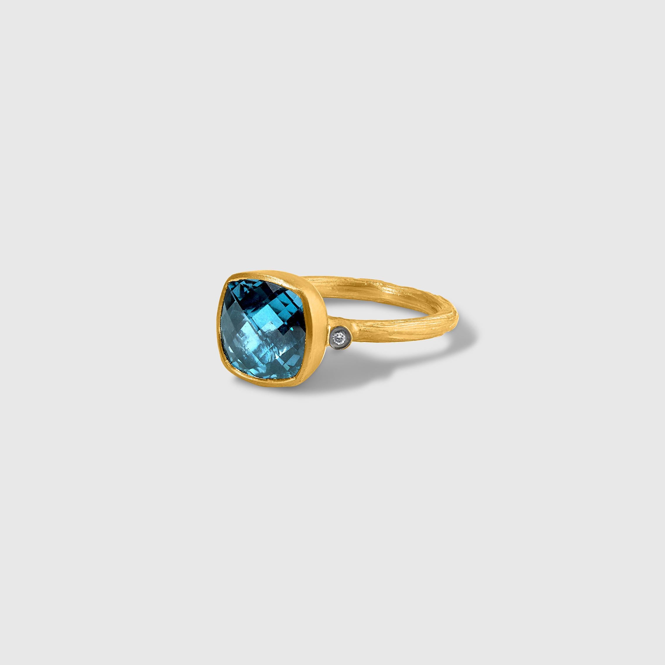 5.74ct Faceted Checkerboard London Blue Topaz and Diamond Ring, 24kt Gold and Silver, Ring details: Size 7 in stock. Diamonds: 0.02ct, Colour: H Clarity: VS2

Made to order sizes take approximately 4-6 weeks.

About Kurtulan:
Kurtulan jewellery