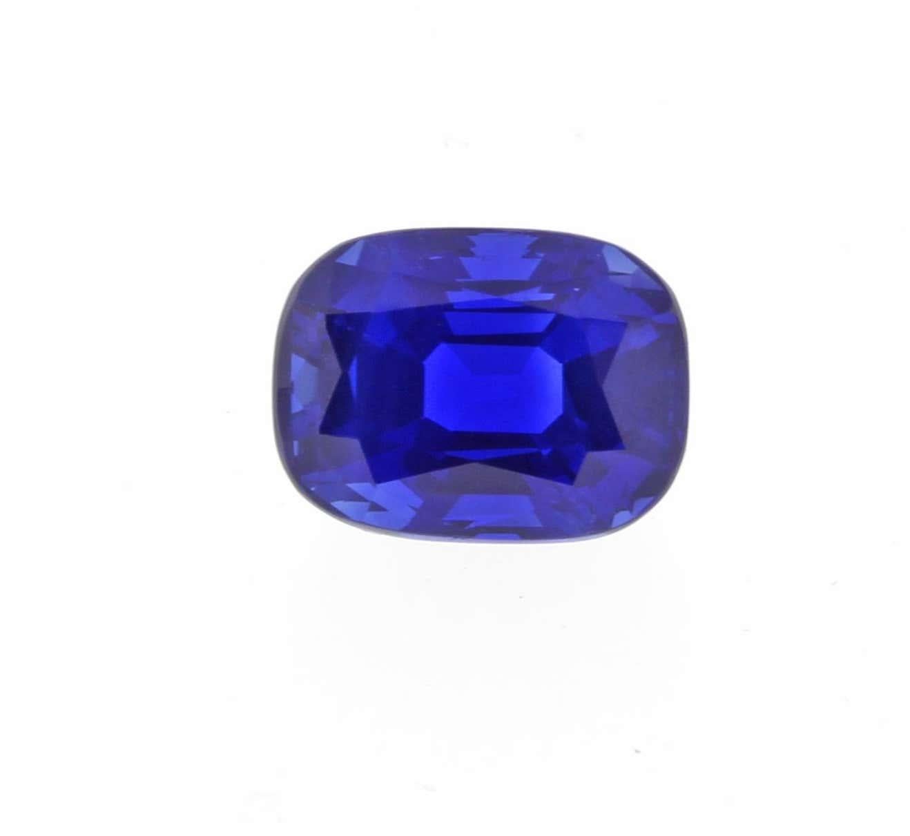 From Pampillonia Jewelers a rare 5.75 carat Kashmir sapphire and diamond ring The sapphire is certified by both A.G.L and Gubelin to be of natural origin from Kashmir with no evidence of heat. The ring is set in platinum with two trilliant cut