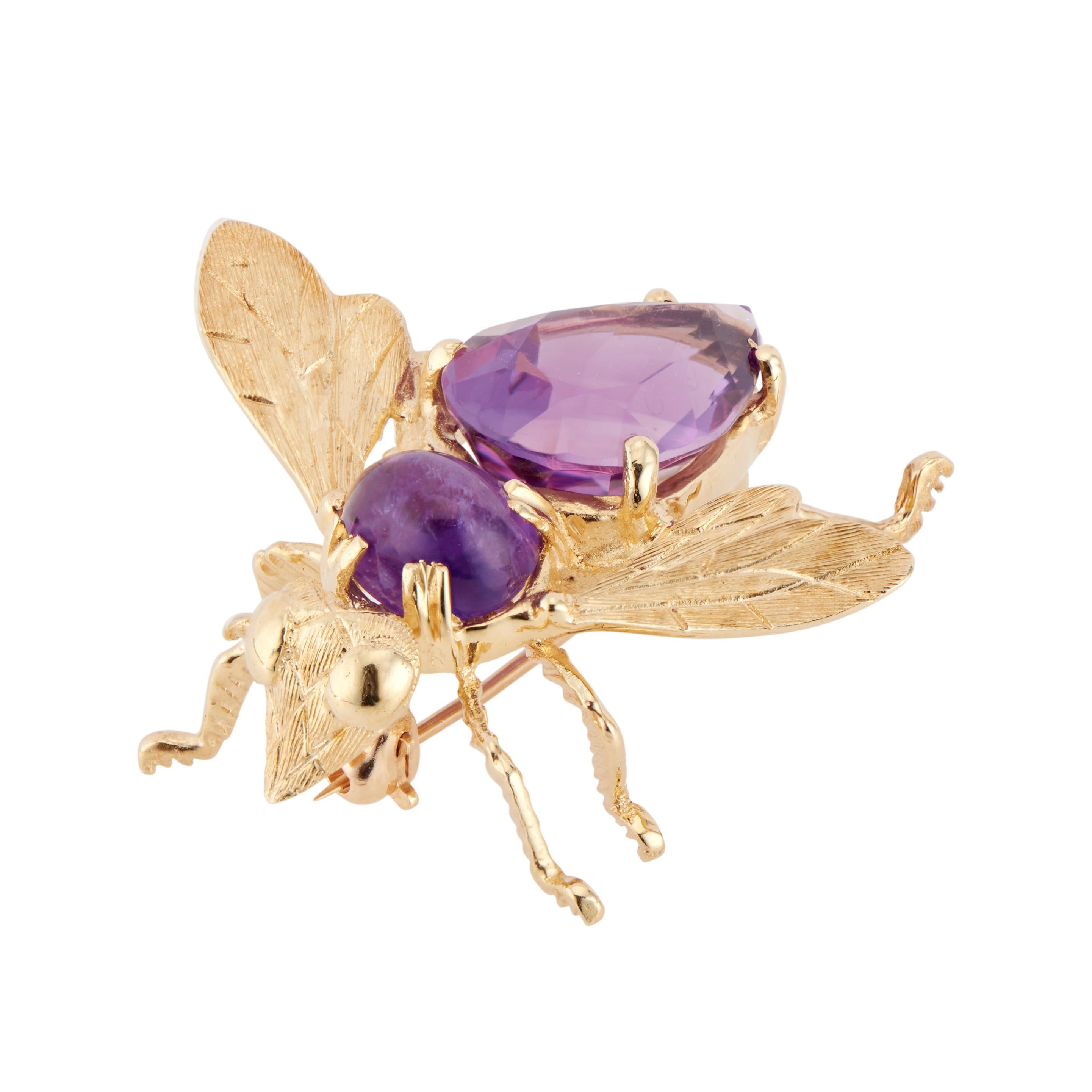 Mid-Century 1960's Amethyst bee brooch.  Natural pear and oval shape amethyst in 14k yellow gold.  

1 pear shape purple amethyst, approx. 4.75cts
1 oval shape purple cabochon amethyst, 1.00cts
14k yellow gold 
Stamped: 14k
6.7 grams
Top to bottom: