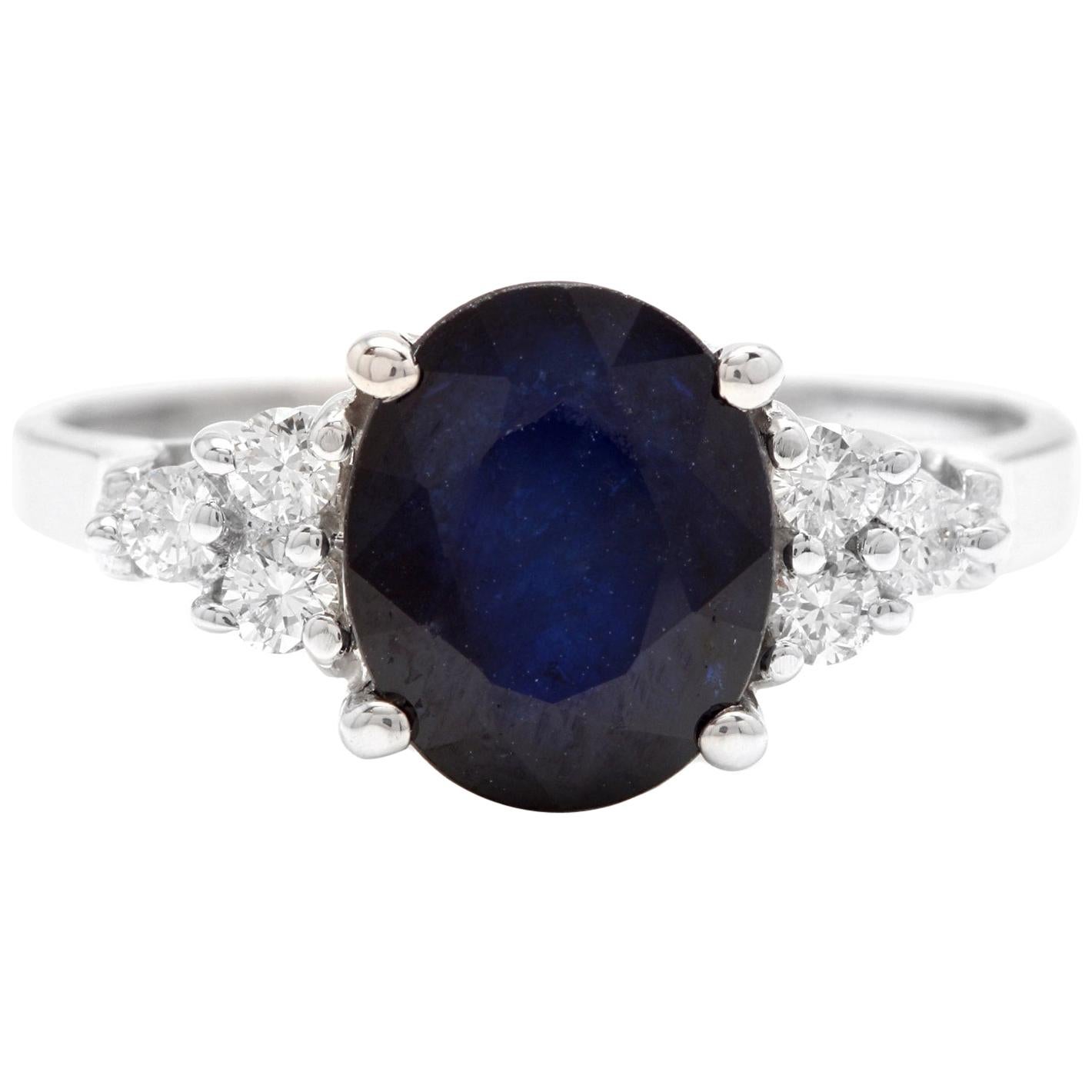 5.75 Carat Natural Blue Sapphire and Diamond 14 Karat Solid White Gold Ring