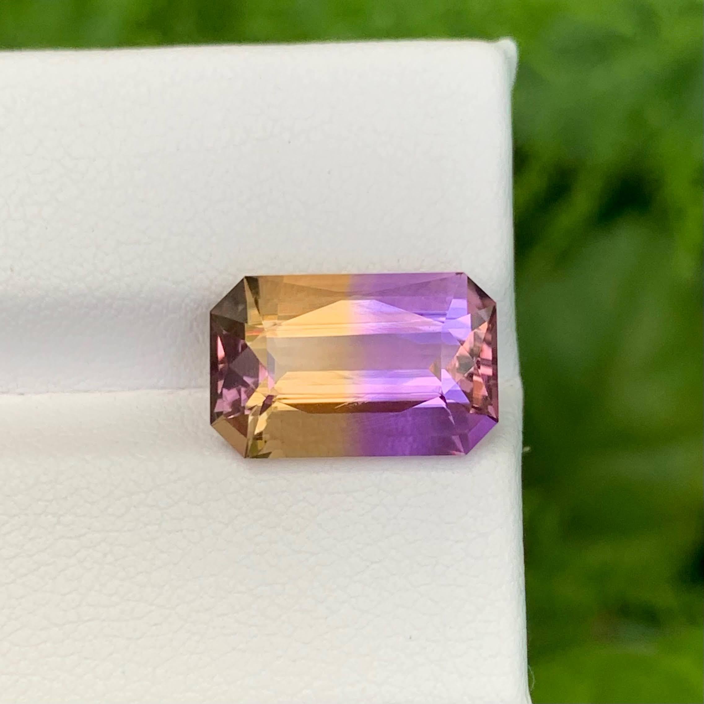 Weight 5.75 carat 
Dimensions 13.9x9.0x6.6mm
Treatment None
Origin Bolivian 
Clarity Loup Clean 
Shape Cut Fancy Emerald 




Discover the rare beauty of this 5.75 Carat Natural Loose Bi-Color Ametrine, masterfully shaped in a unique fancy emerald