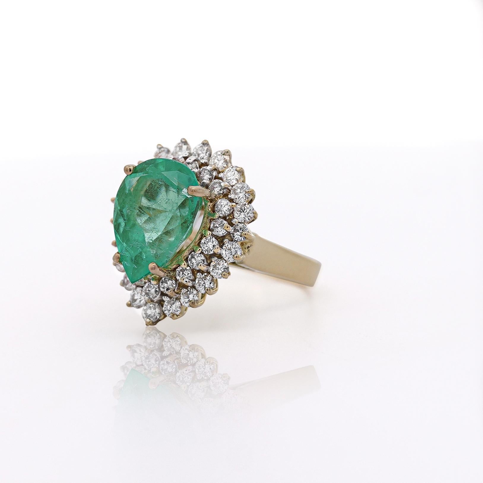 Modern 5.75 Carat Pear Cut Colombian Emerald Diamond Halo 18K Gold Emerald Ring For Sale