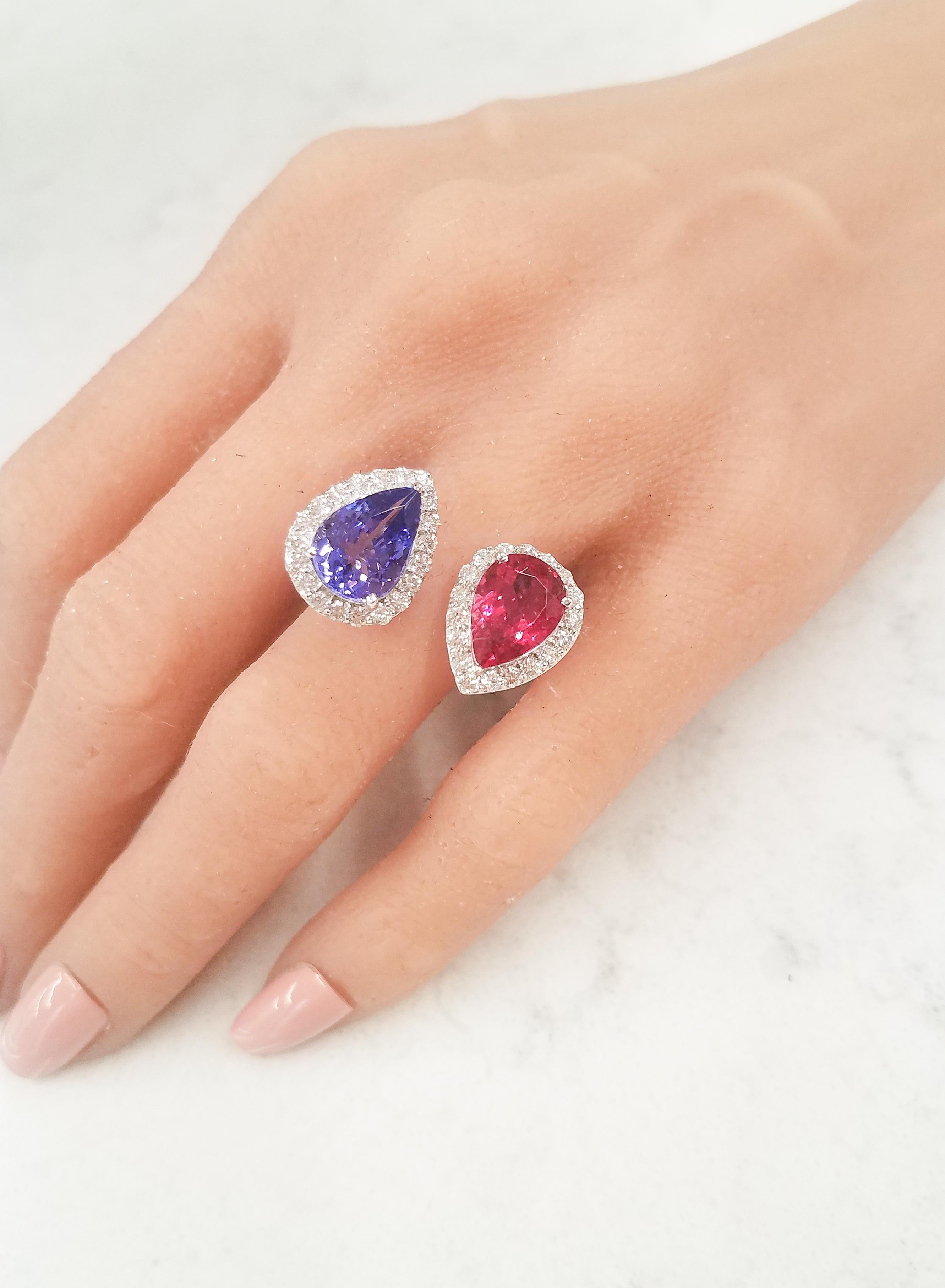 An architecturally beautiful design, our Two Stone Non-connect Ring has two faceted gemstones, totaling 5.75 carats, that appear to float on your hand. The 3.10 carat tanzanite source is near the foothills of Mt. Kilimanjaro in Tanzania. Its color