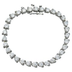 Bracciale tennis con diamanti tondi e brillanti da 5,75 carati totali in oro bianco 14 carati