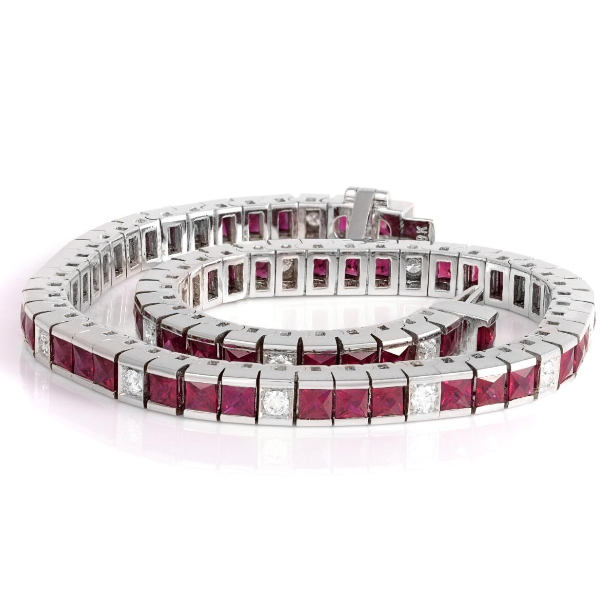 5.75 carats of natural vivid princess-cut rubies are punctuated by 0.50 carats of white brilliant-cut diamonds in this update on the classic line bracelet. A beautiful example of understated classic jewelry, this bracelet can be worn alone or