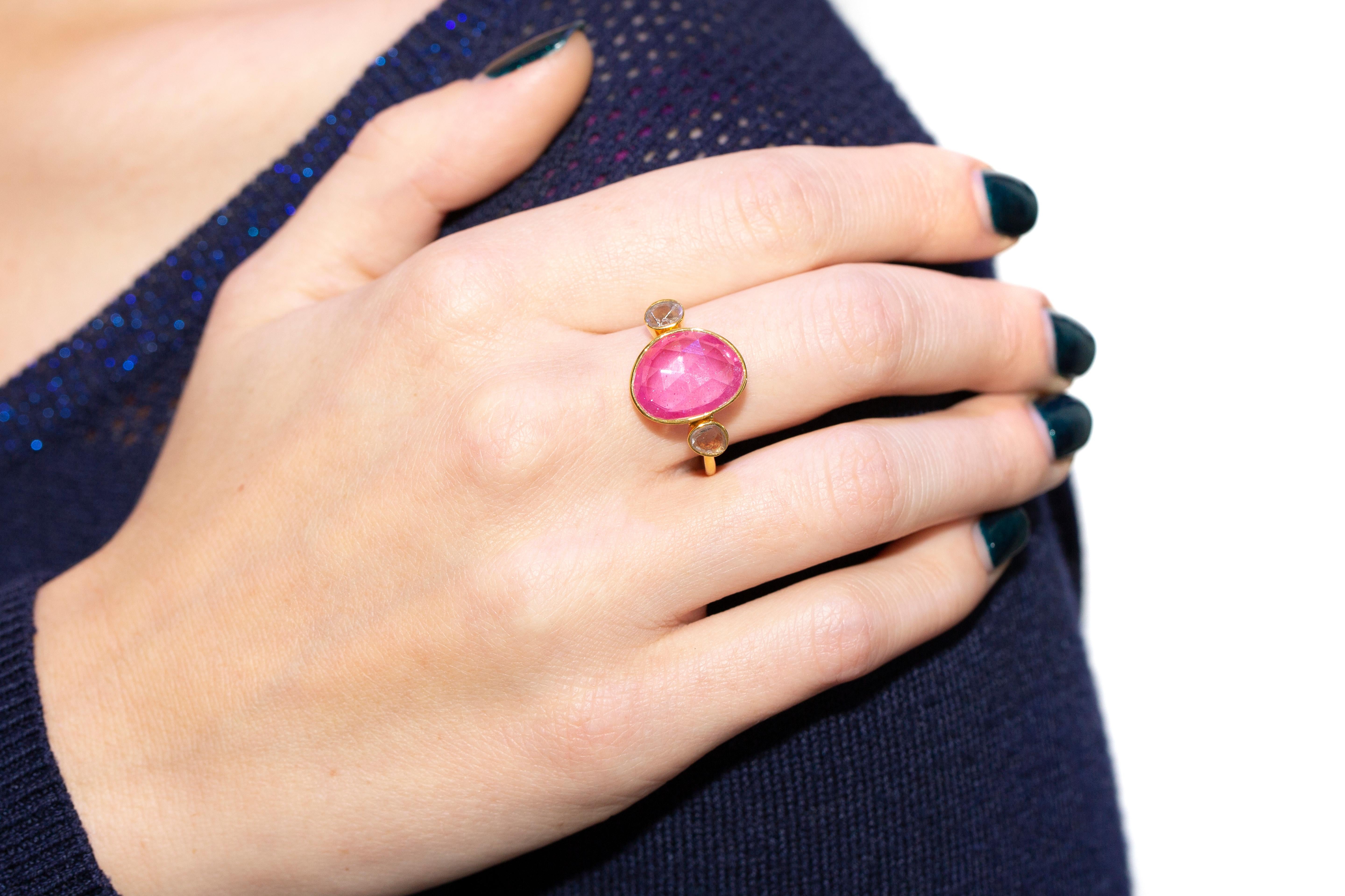 This Gorgeous 5.60 Carat Ruby ring features 0.15 Carat in two Diamond slices one on each side set in 18 Karat Yellow Gold. This unique Ruby and Diamond 3 stone Rose Cut ring is perfect for any occasion night or day. Each piece is hand made with a