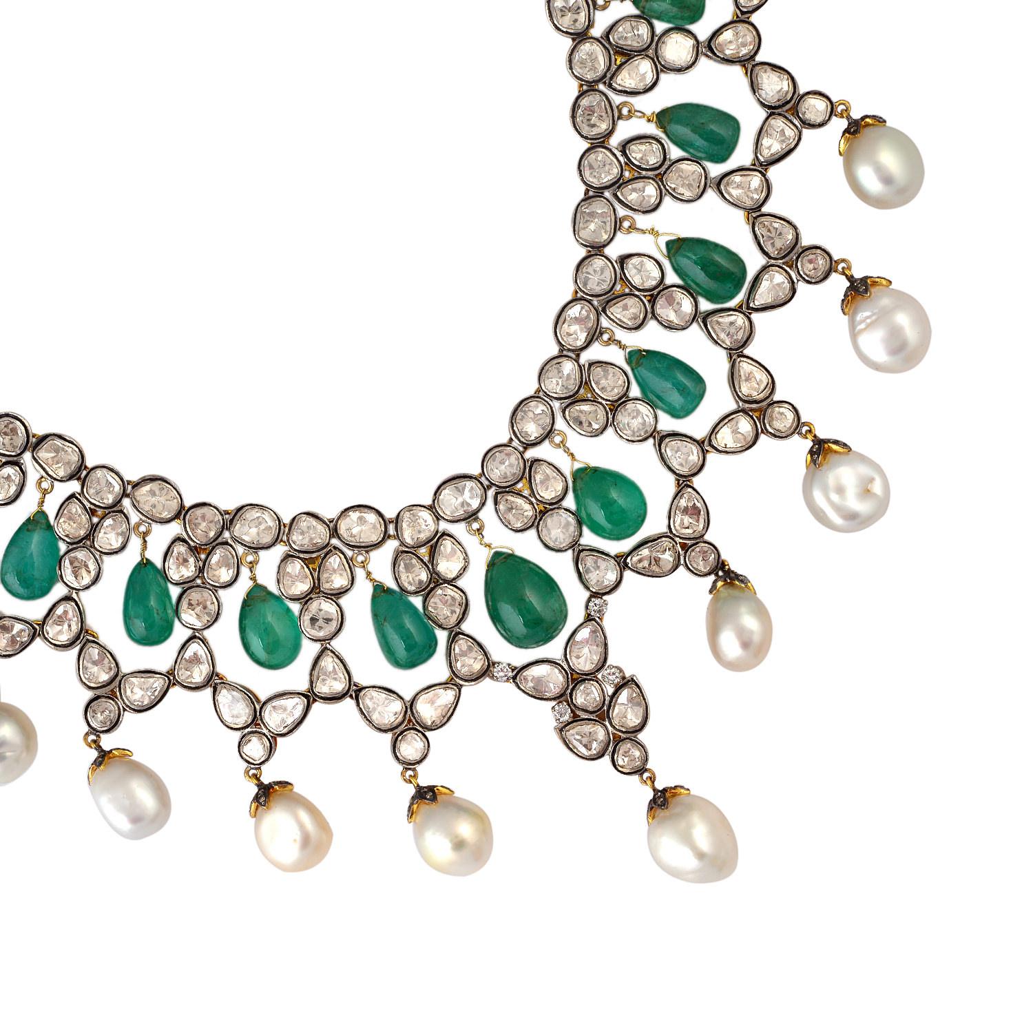The Maharaja collection inspired by the Moghul Era & Indian heritage.
A stunning necklace handmade in 14K gold and sterling silver. It is set in 57.52 carats emerald, 104.62 carats pearl & 15.41 carats of rose cut diamonds. Lobster clasp