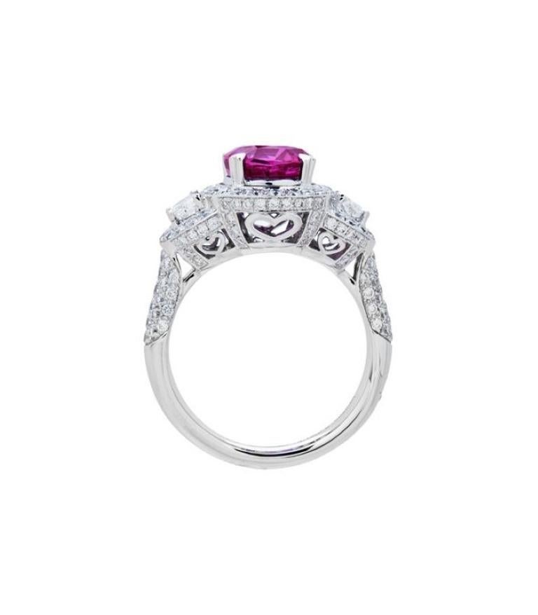 One of a kind 5.76 Carat Cushion Cut Rare Pink Sapphire and Diamonds in Gold.

*RING* One exclusive AMORO eighteen karat white gold Pink Ceylon Sapphire and Diamond ring featuring; one heart prong set cushion cut genuine pink Sapphire weighing
