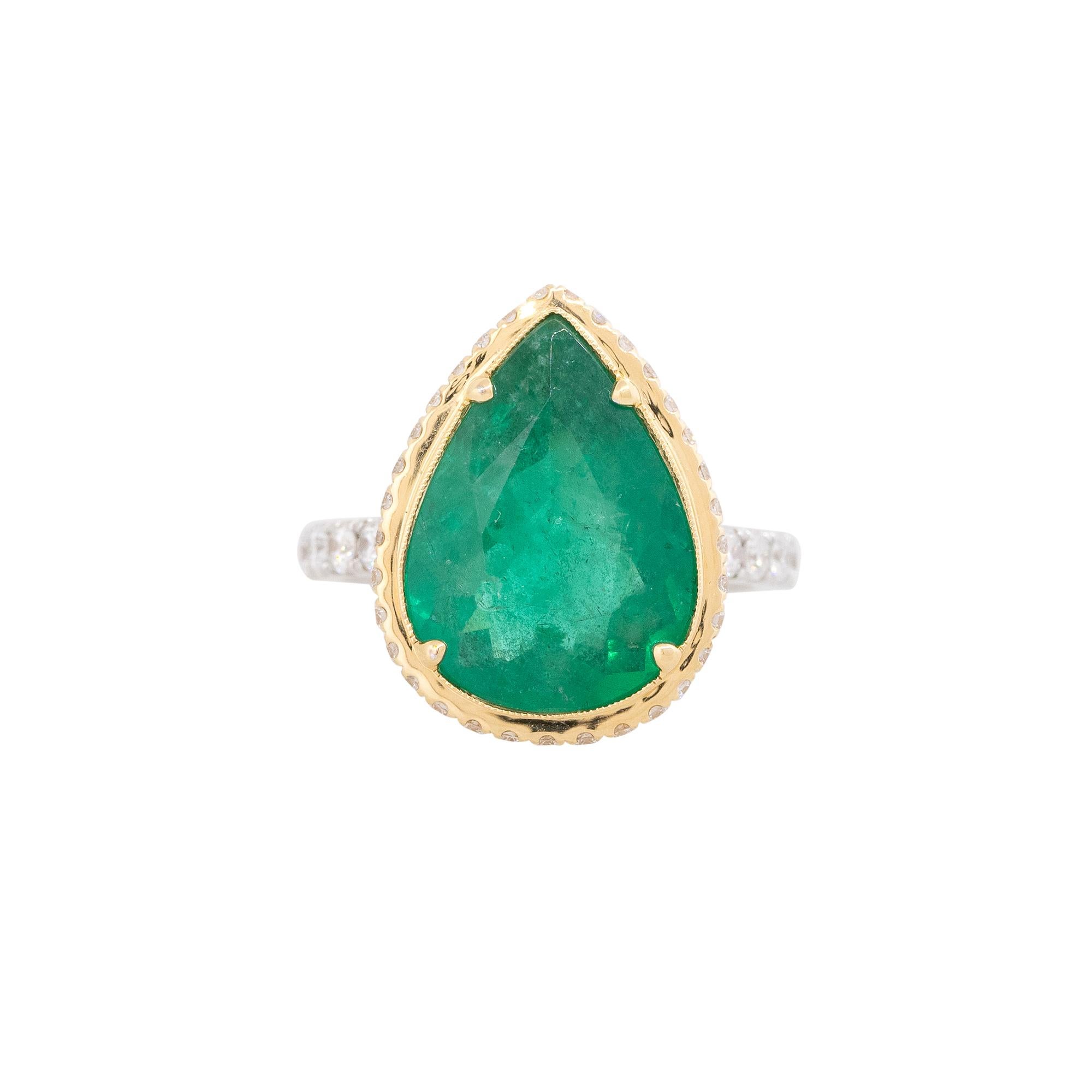 18k Two-Tone Gold 5.76ct Emerald & 0.68ct Diamond Halo Ring

Product: Emerald Gemstone and Diamond Halo Ring
Material: 18k White Gold & 18k Yellow Gold
Gemstone/ Diamond Details: The main stone is a Pear Shaped Emerald Gemstone, weighing