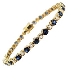 Alternating Natural Sapphire and Natural Diamond Tennis Bracelet in Yellow Gold
