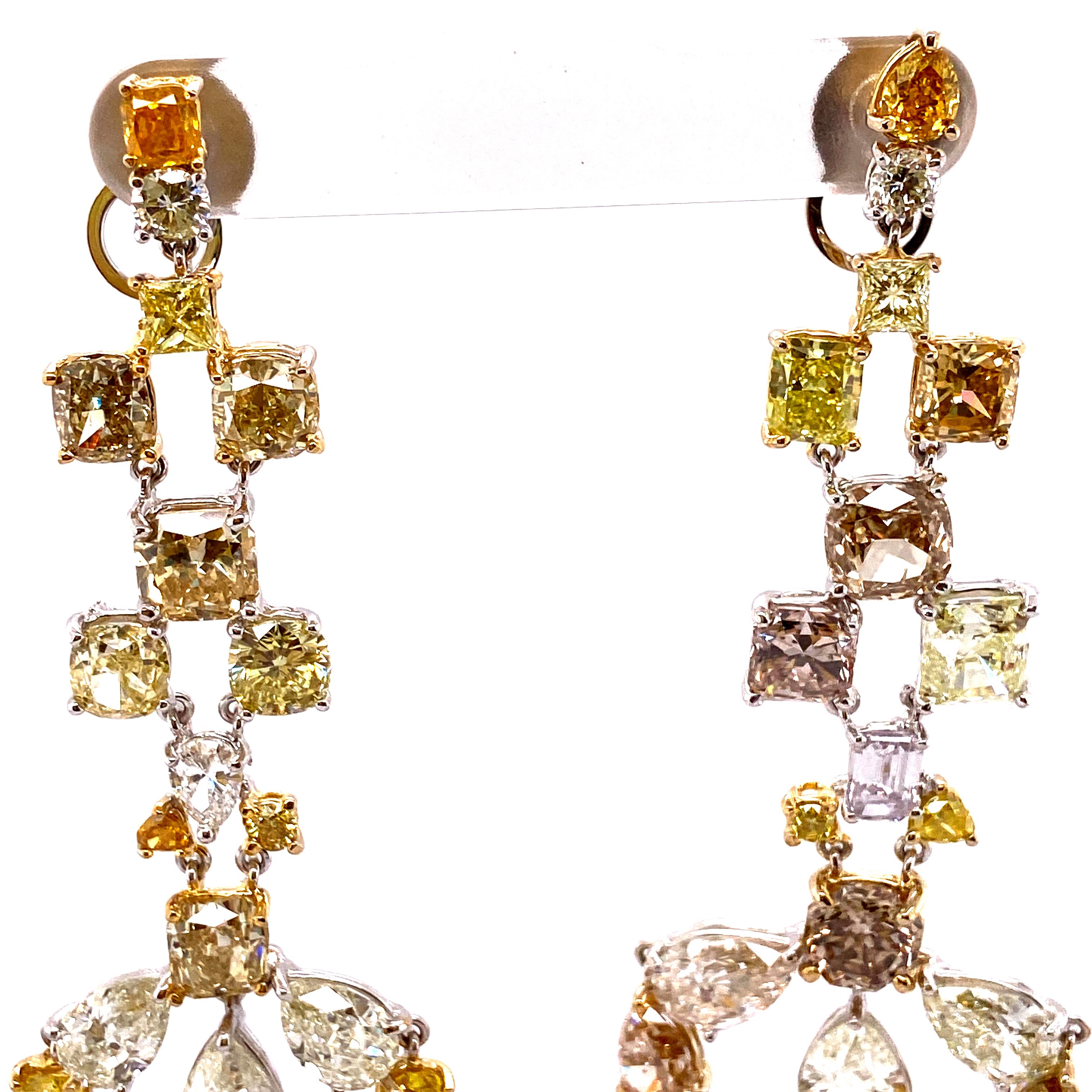 57.64 Carat Fancy Coloured Diamonds and White Diamond Chandelier Gold Three-Way Detachable Earrings:

An incredibly rare collection of white and fancy coloured diamonds, it features a staggering 66 pieces of diamonds with varying hues and tones