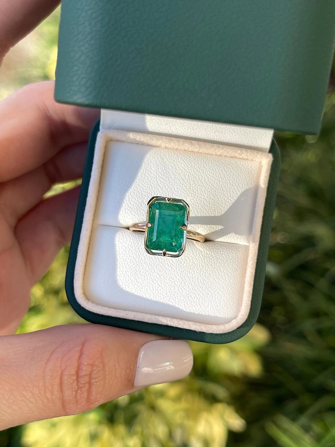 5.76ct 14K Open Basket Rich Lush Green Emerald Cut Emerald Solitaire 4Prong Ring In New Condition For Sale In Jupiter, FL