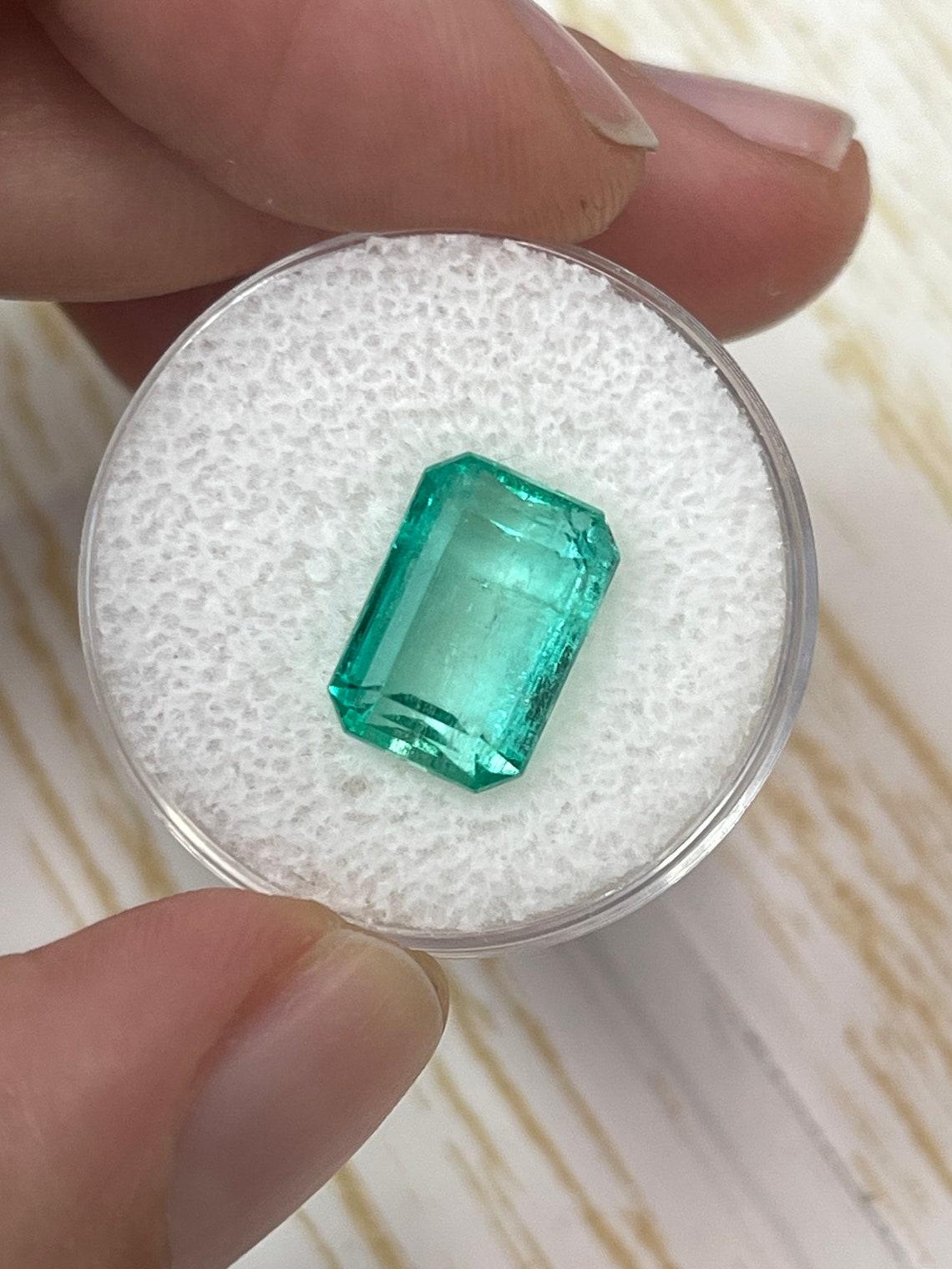 Women's or Men's 5.76ct Clear Green Muzo Emerald Cut Gem 12x8 Genuine May Birthstone For Sale