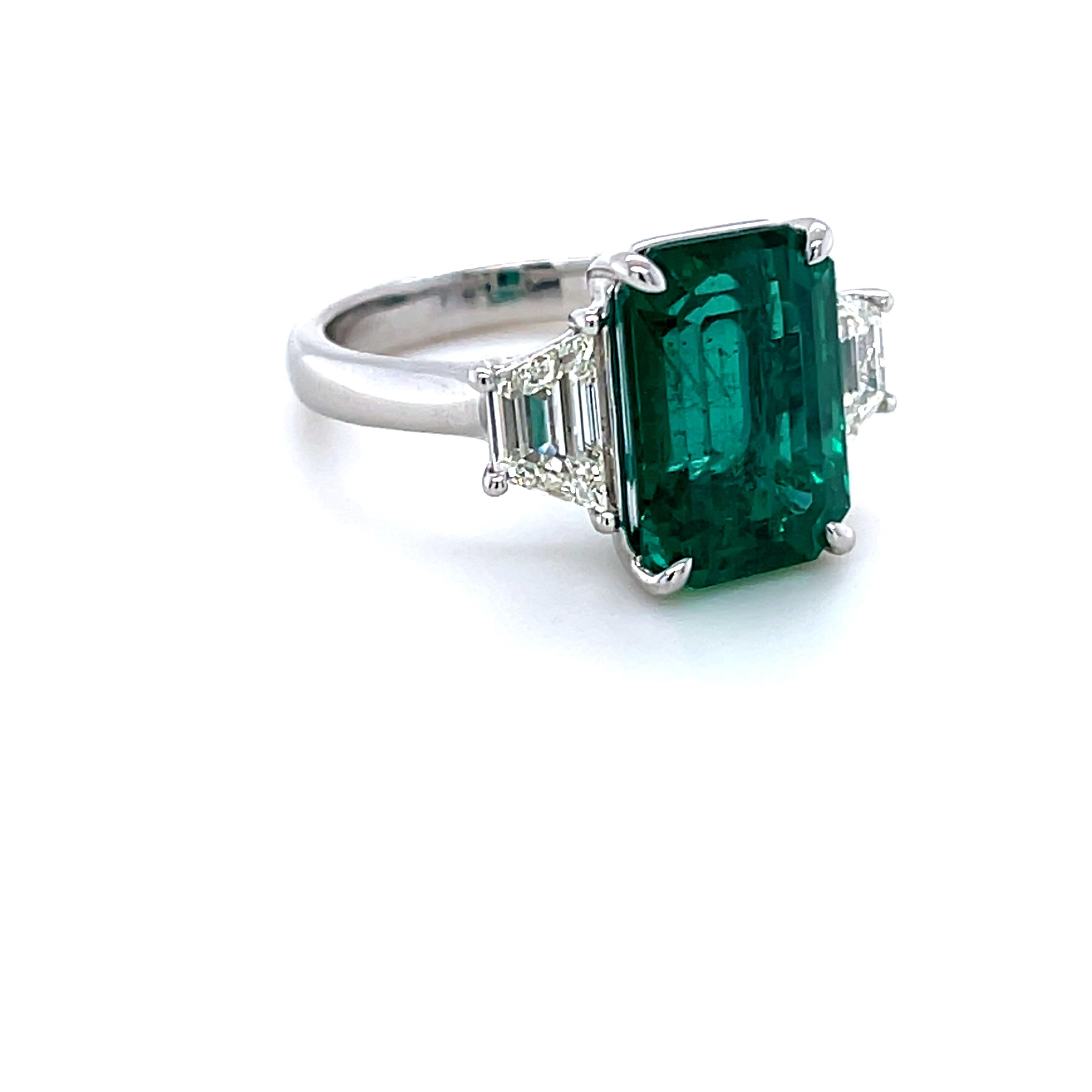 Modern 5.77 Carat Emerald Cut Emerald & Diamond Ring in Platinum For Sale