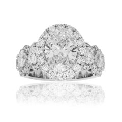 5.77 Carat Oval Diamond Ring Brilliant White 18K Gold Signature Sophistication
