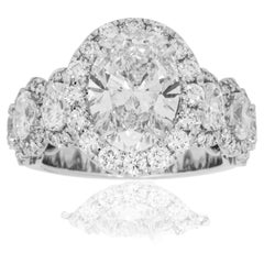 5.77 Carat Oval Diamond Ring Brilliant White 18K Gold Signature Sophistication