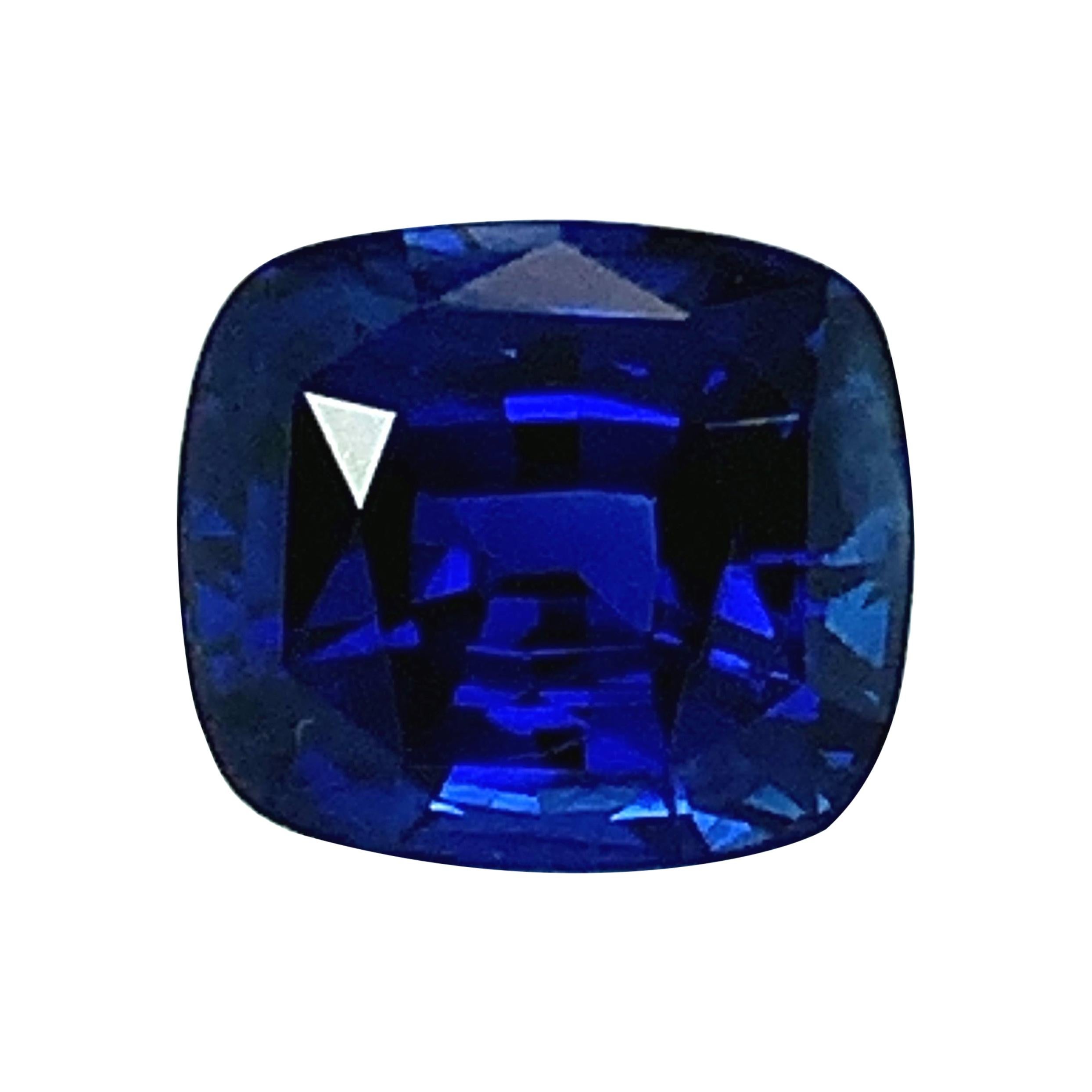 This extremely fine cushion-shaped blue sapphire is what dreams are made of. This exquisite gem possesses exceptionally fine color - the perfect shade of vivid, rich blue, with excellent color saturation and superior clarity. It measures 10.12 x