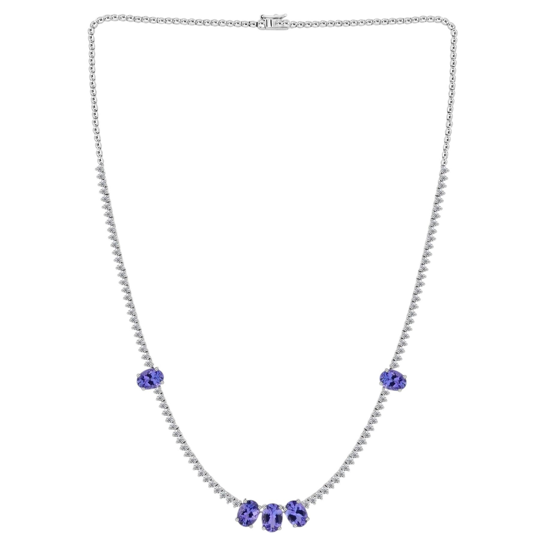 Collana “tennis” con tanzanite naturale da 5,77 ct e diamanti da 2,75 ct, in oro bianco 18 carati