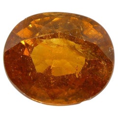 grenat spessartite orange fantaisie taille ovale de 5,77 carats
