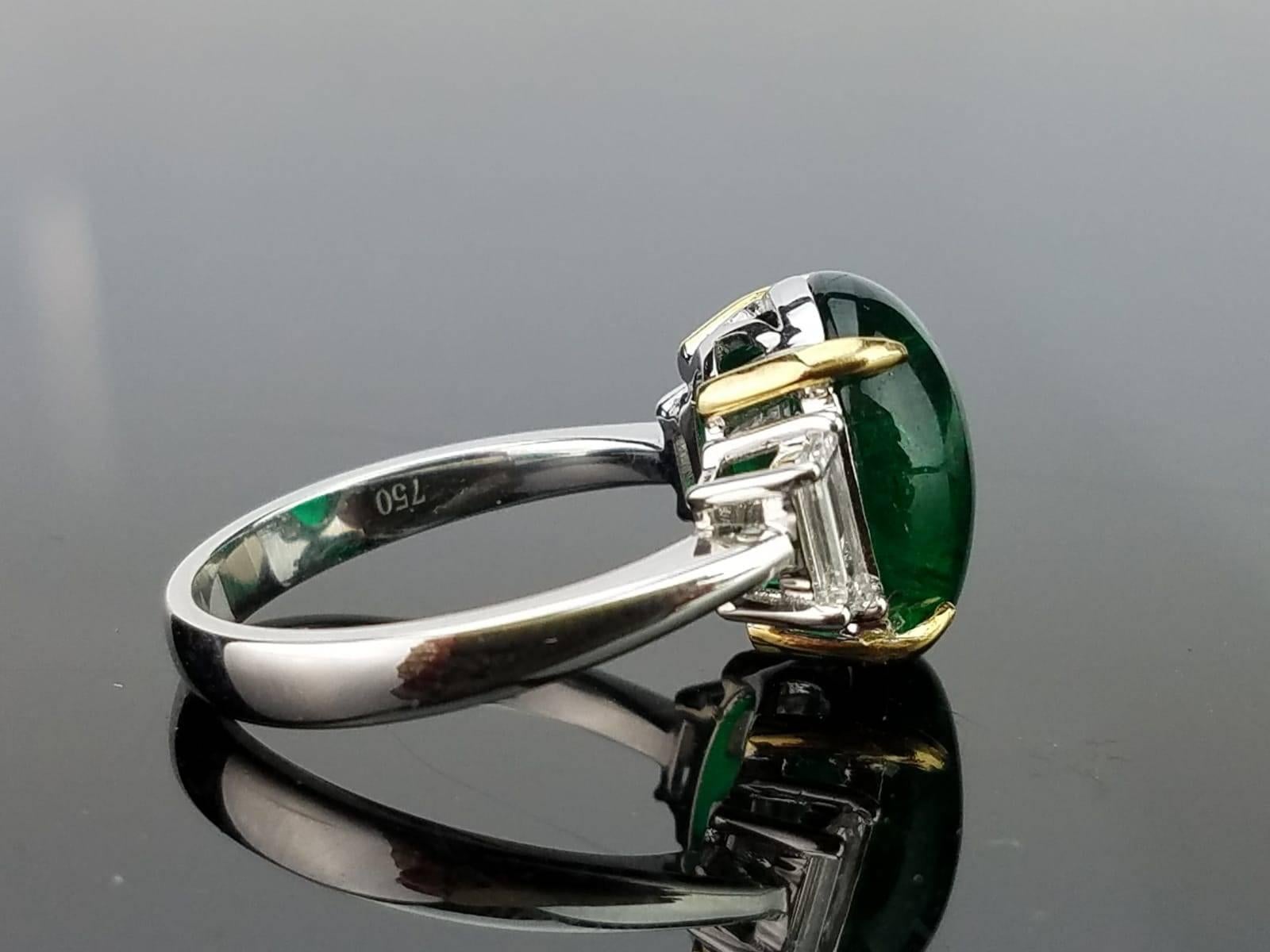 Art Deco 5.78 Carat Emerald Cabochon and Diamond Three-Stone Ring