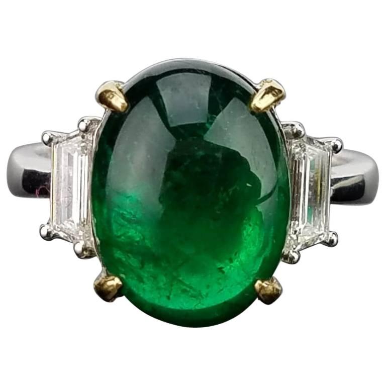 5.78 Carat Emerald Cabochon and Diamond Three-Stone Ring