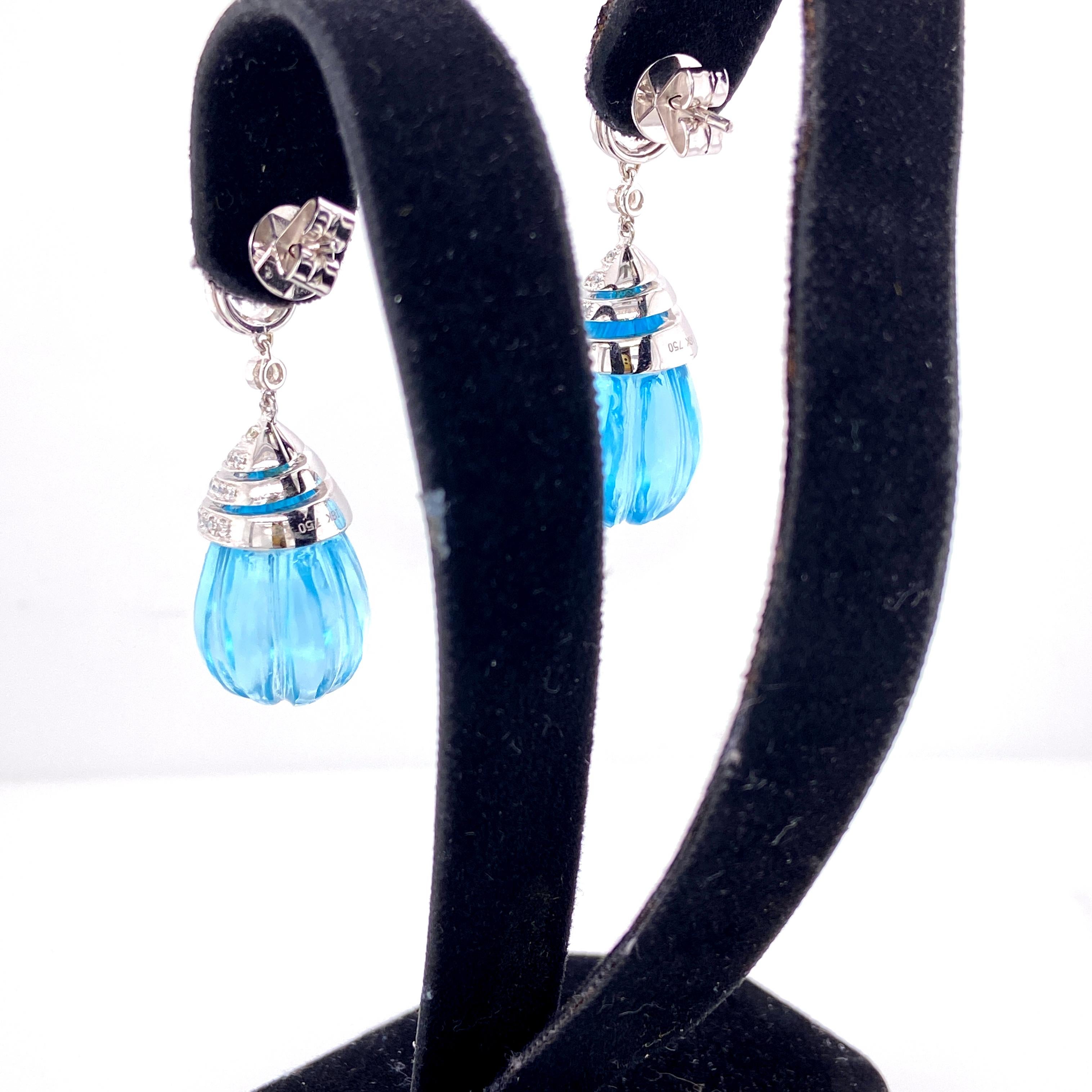 Women's or Men's 57.82 Carat Carved Blue Topaz Drops and White Diamond Gold Earrings For Sale