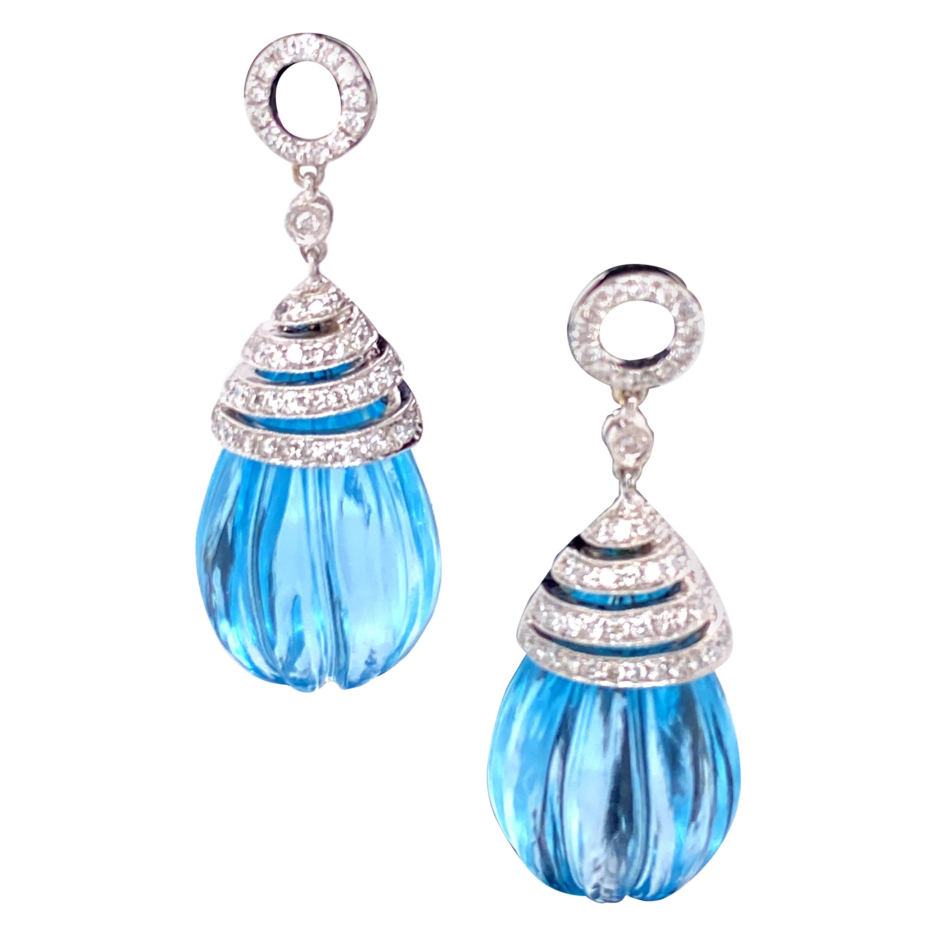 57.82 Carat Carved Blue Topaz Drops and White Diamond Gold Earrings For Sale