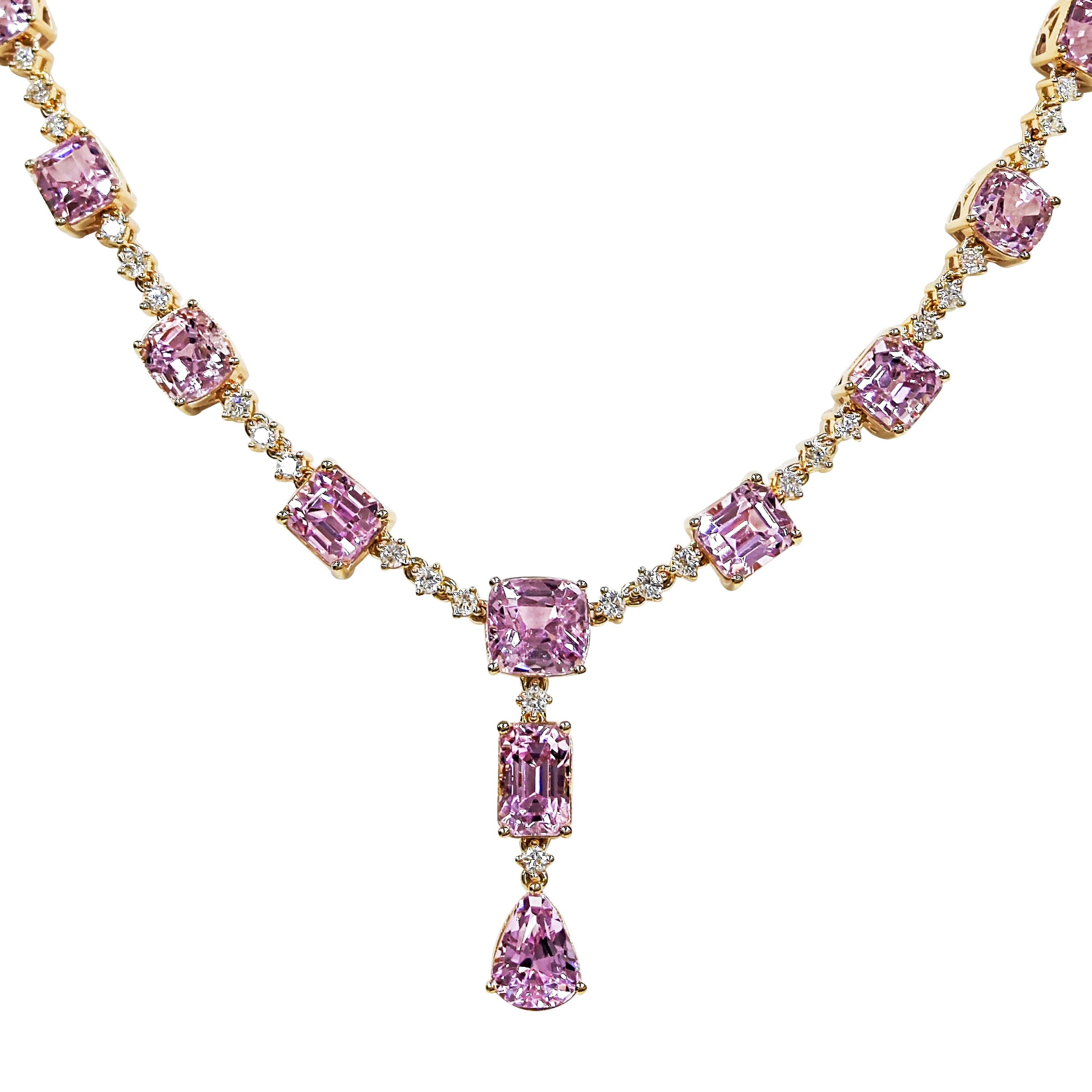 19 Kunzite Gemstones: 55.07 Carats
50 White Diamonds: 2.8100 Carat, Round Cut
Metal: 18K Yellow Gold, 37.30 Grams