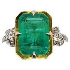 5.79 Carat Zambian Emerald in Forget Me Knot Style Ring with Diamonds