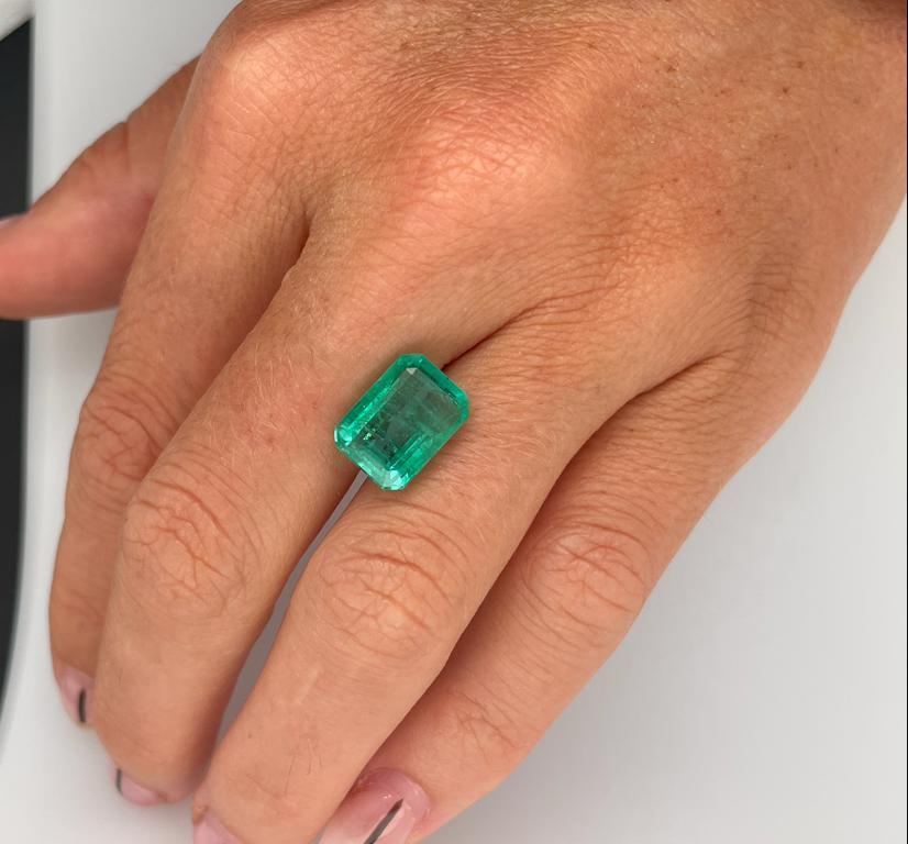 5.79ct Zambian Emerald in Forget Me Knot Style Ring 13