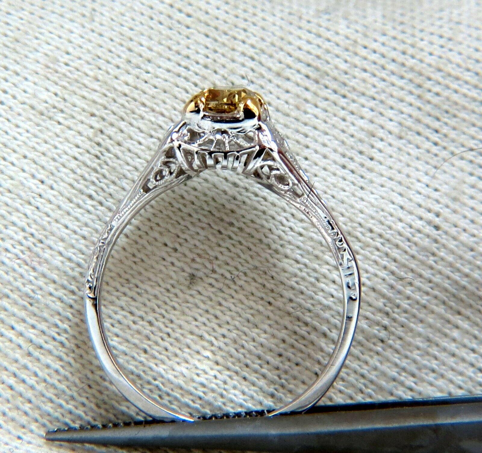 Vintage Gilt

.57ct. Natural Fancy Orange brown round brilliant diamond ring.

Vs-2 clarity and full cut.

14kt.  yellow  gold

Top deck: 7.2 mm wide 

Depth: 5.9mm

1.7 grams

Excellent well made mounting

thick and solid for the everyday 

current