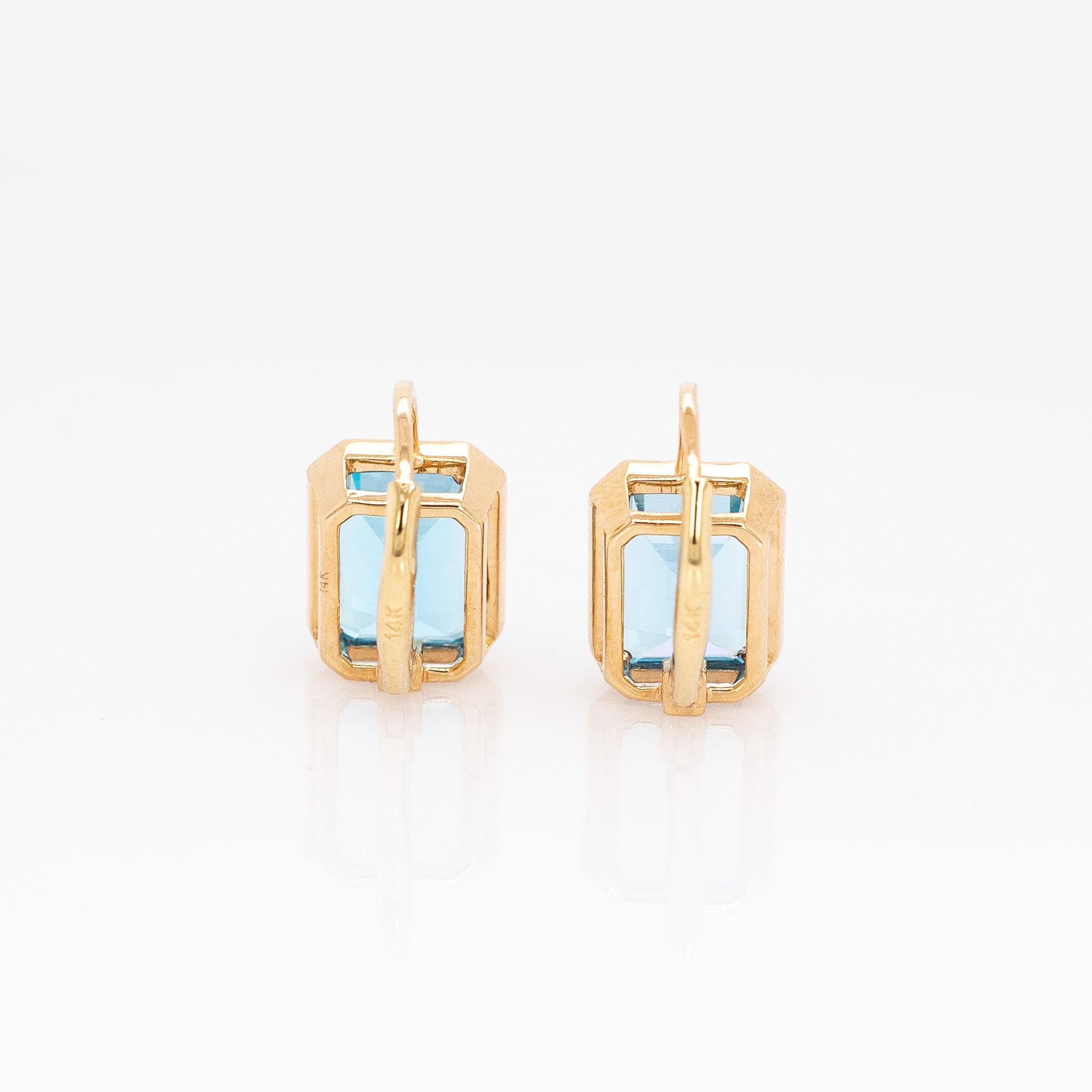 5,7cts Brasilianischer Himmelblauer Topas Ohrringe: Massiv 14k Gelbgold, Smaragd 9x7mm im Angebot 1