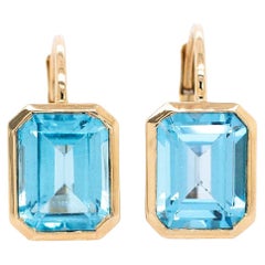 Boucles d
oreilles 5.7cts Brazilian Sky Blue Topaz : Or jaune 14k massif, Émeraude 9x7mm