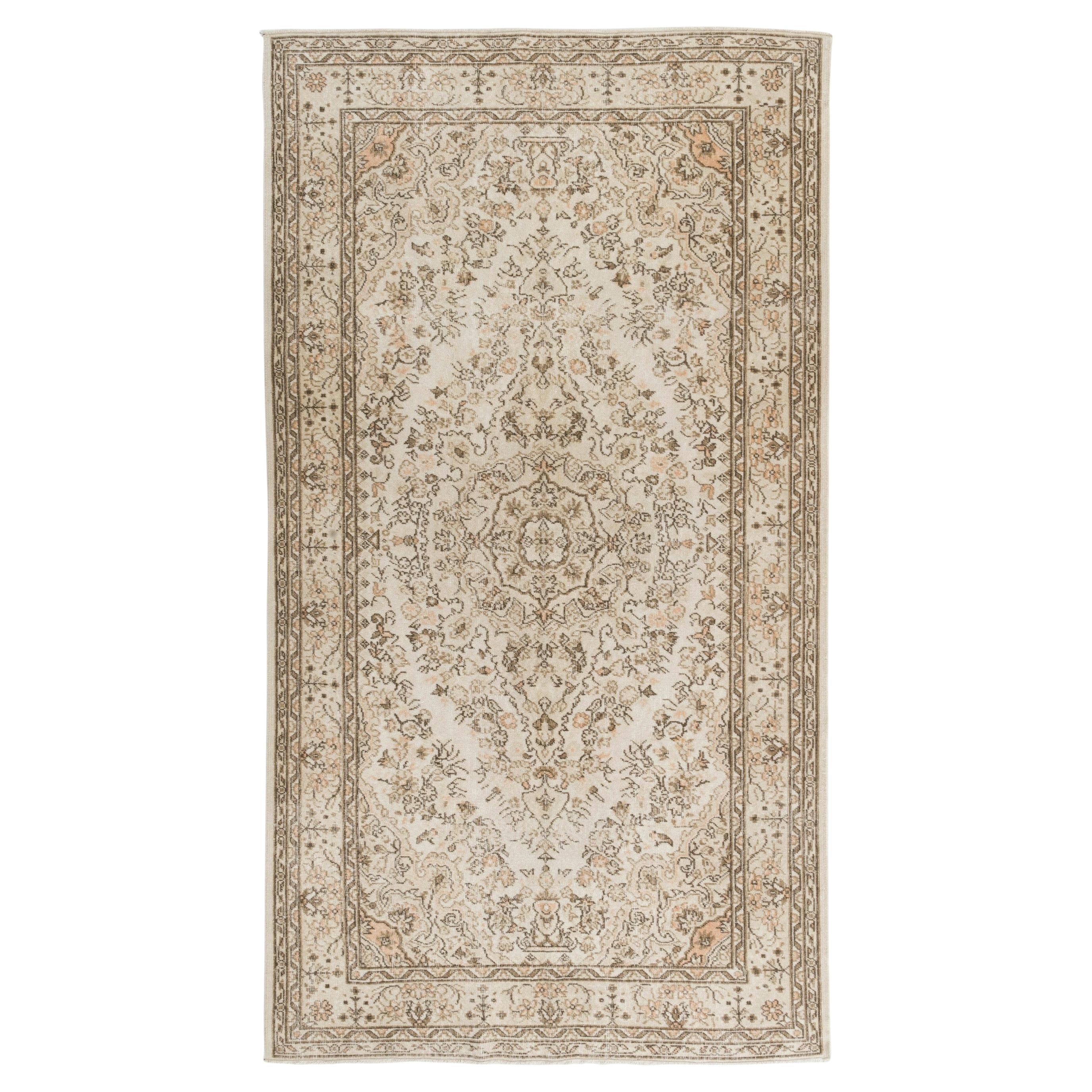 5.7x10 Ft Vintage Hand-Knotted Floral Turkish Oushak Area Rug in Soft Colors For Sale