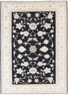5.7x8 ft Hand Knotted Floral Area Rug with Black Field and Beige Border