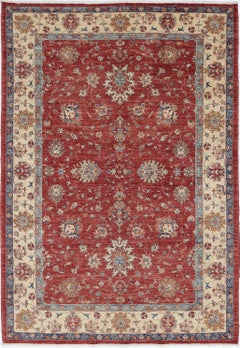 5.7x8.2 ft Hand Knotted Red Turkish Area Rug with Ivory Border and Blue Details