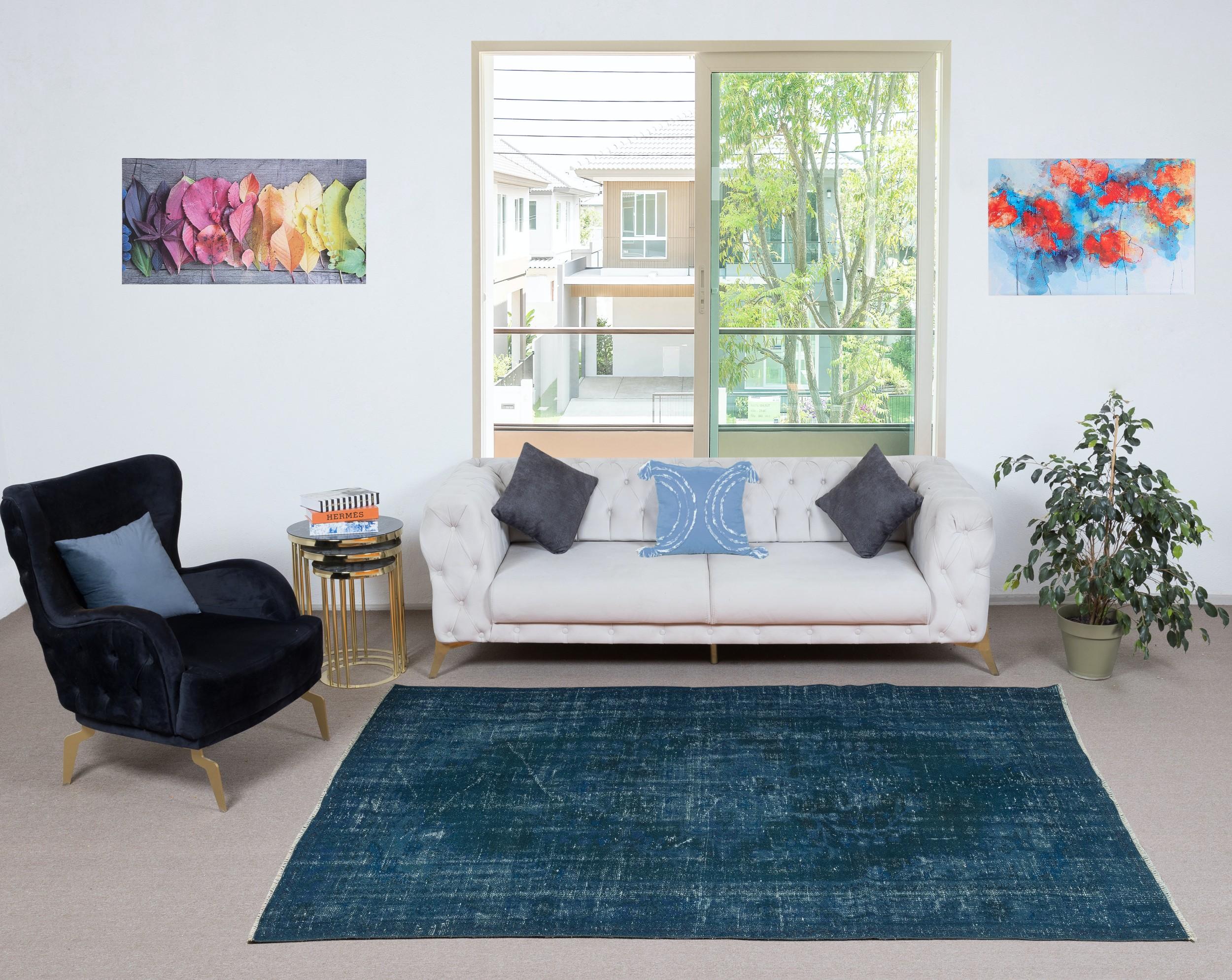 Our over-dyed rugs are all hand-knotted vintage pieces that are recreated in our workshop to cater to a wider range of interior design choices from modern to coastal, from industrial to rustic/cottage. These 50 to 70 year-old rugs were hand-knotted