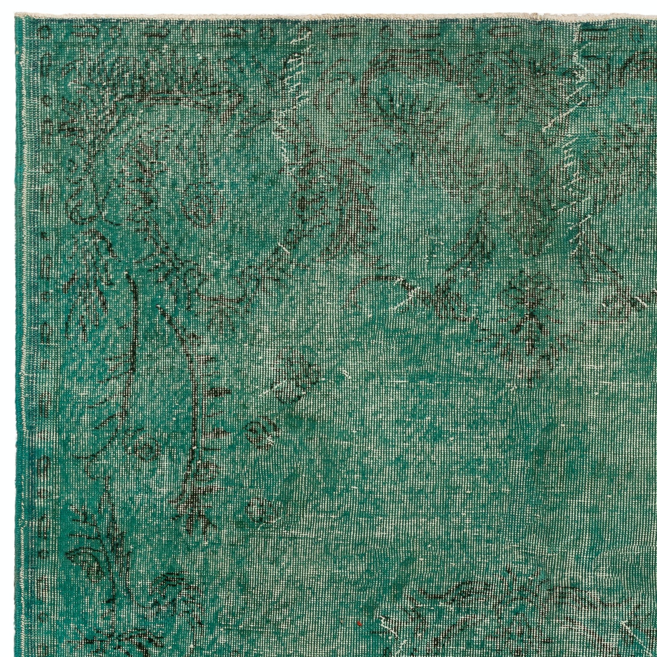 A vintage Turkish rug re-dyed in Teal color. Measures: 5.7 x 9 ft.
Finely hand knotted, low wool pile on cotton foundation. Deep washed.
Sturdy and can be used on a high traffic area, suitable for both residential and commercial interiors.