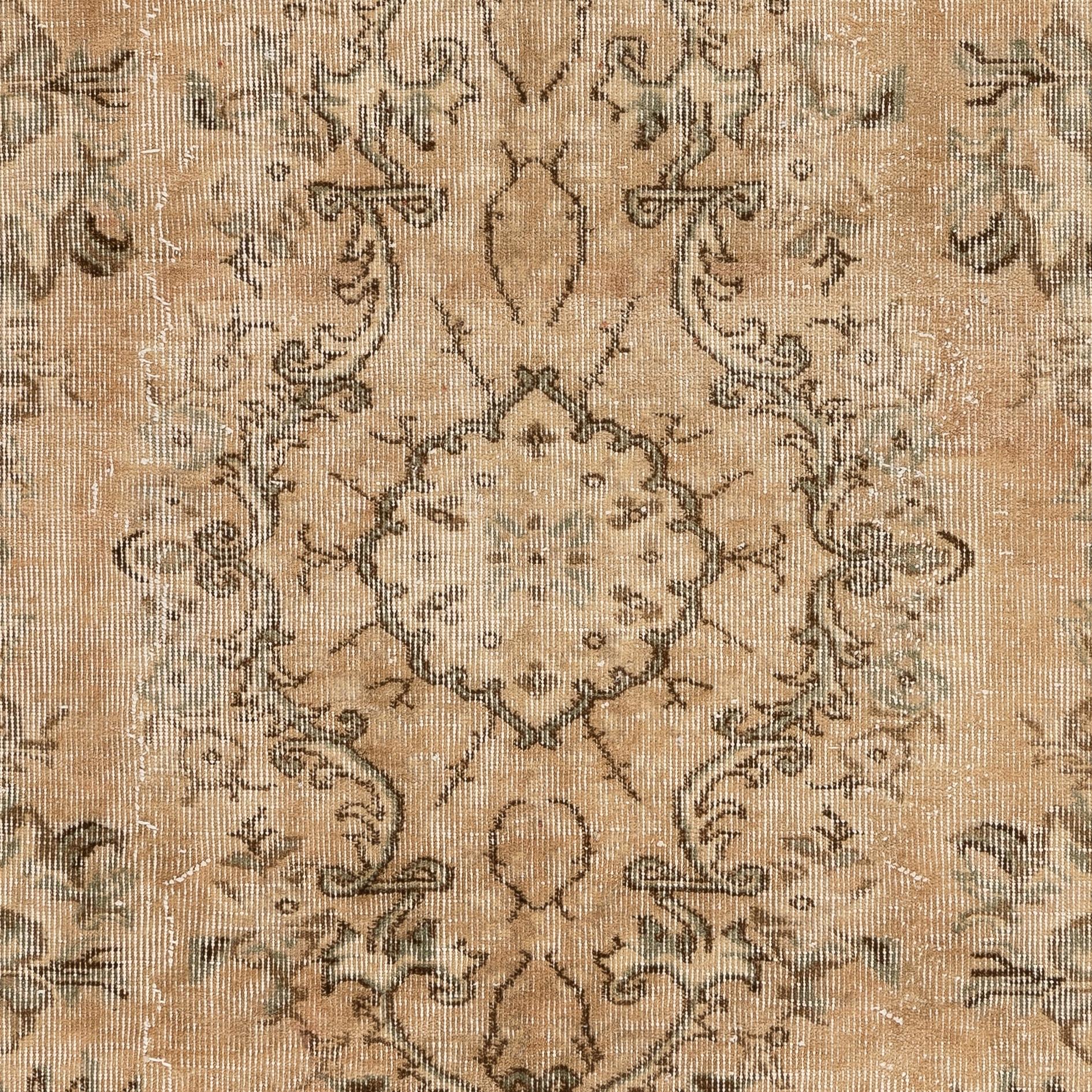 A finely hand knotted rug from Central Anatolia with soft neutral colors and low wool pile on cotton foundation. The rug is in very good condition and washed professionally. It is heavy and lays flat on the floor, suitable for both residential and